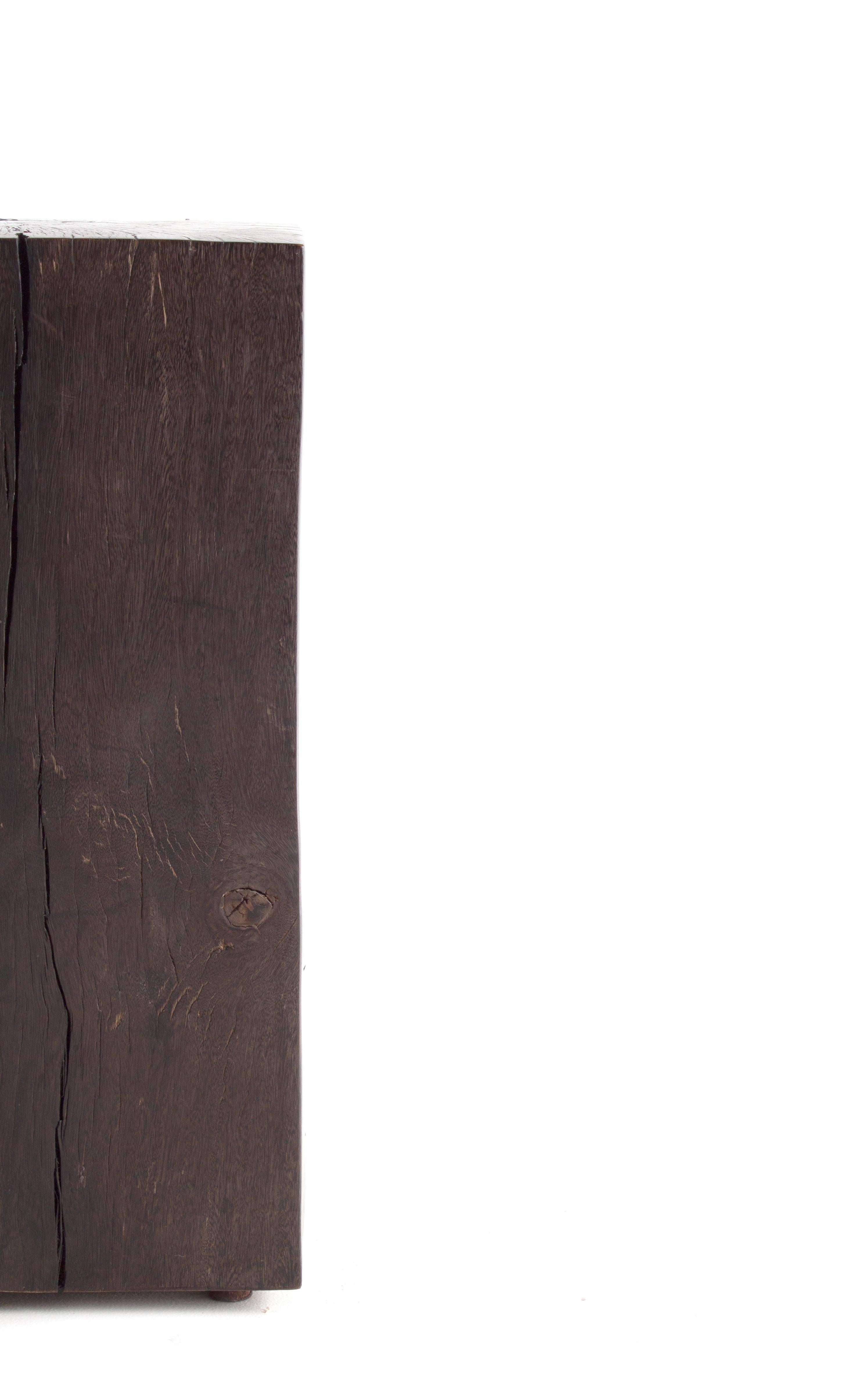 Contemporary form ebonized block teak end table.