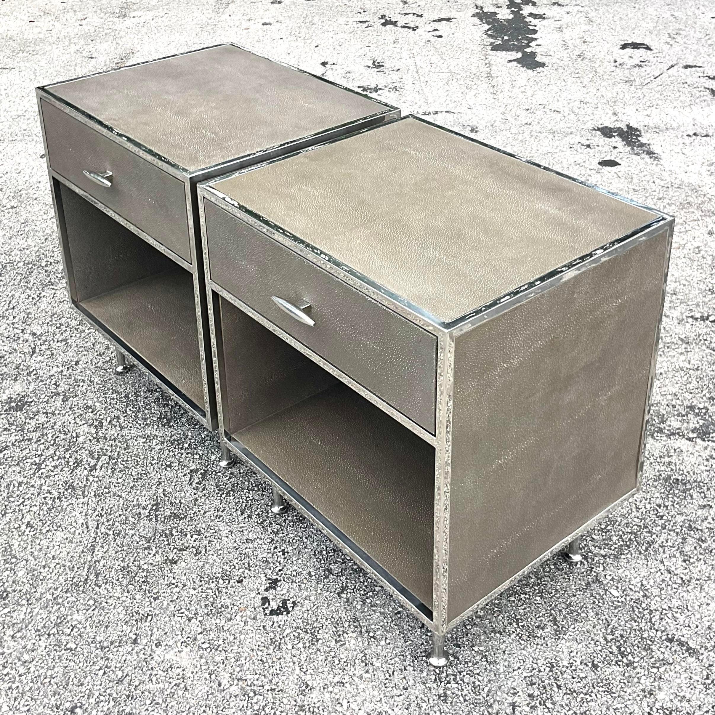 Add modern sophistication to your bedroom with this pair of vintage Contemporary Four Hands faux shagreen nightstands. American-crafted with sleek design, these nightstands blend luxurious texture with functional elegance, elevating your bedside