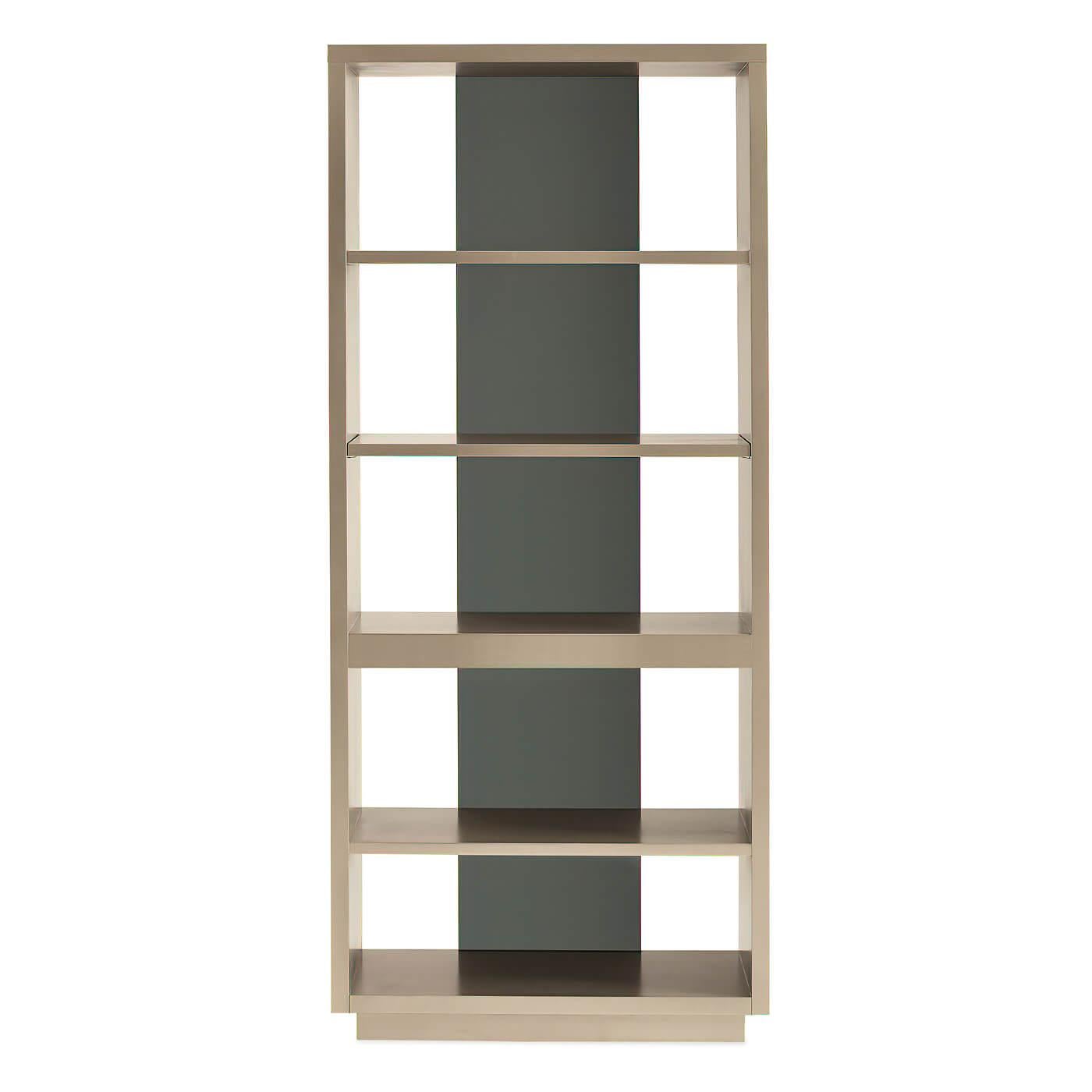 A contemporary four-shelf etagere with a panel of black glass and four shelves for storing and displaying your favorite books, photos, and treasures. A glamorous finish of Twinkling Argent highlights its thoughtfully designed form while adding