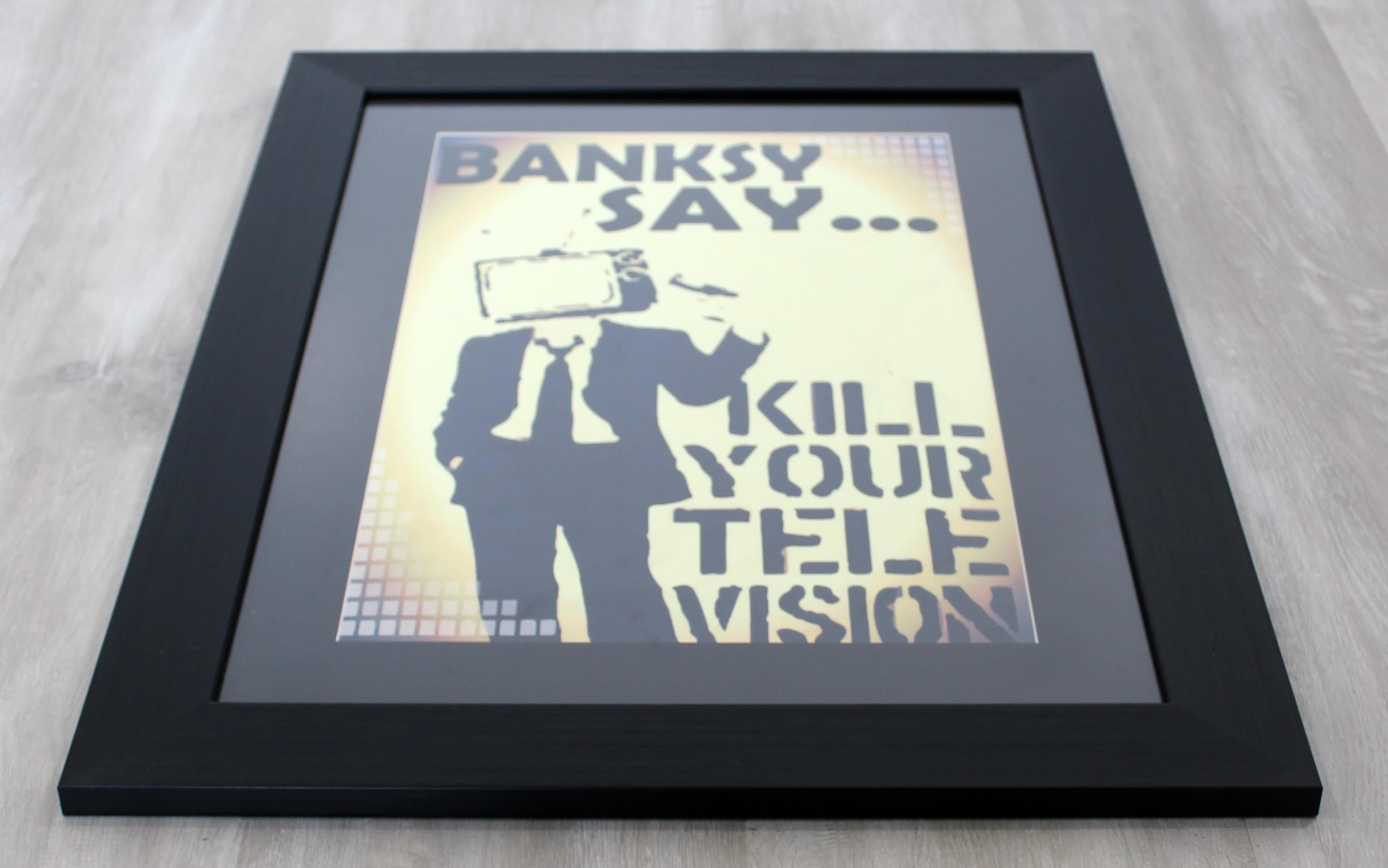 For your consideration is a framed offset lithograph of Bansky's 