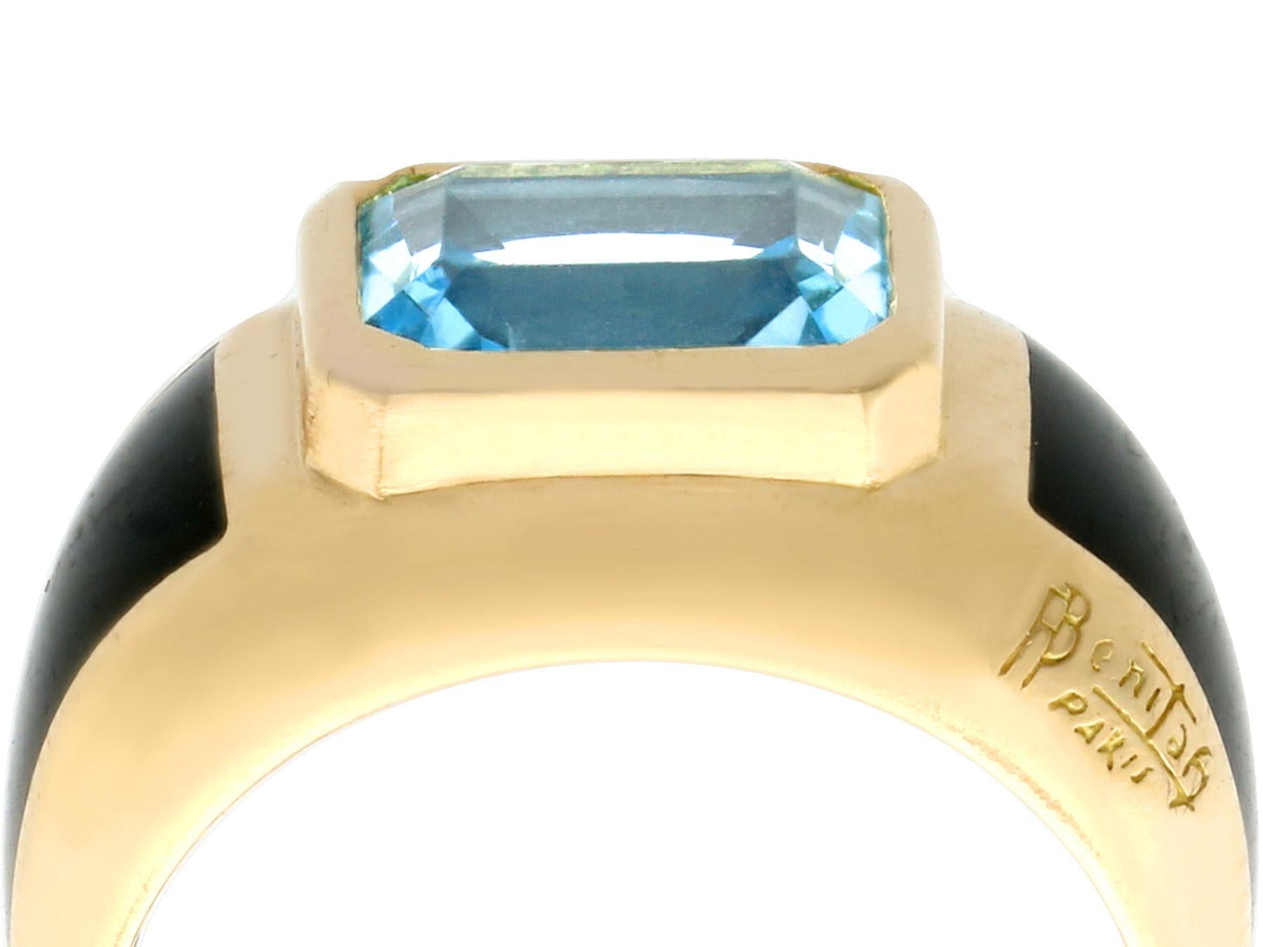 An impressive French 3.11 carat blue topaz and 18 karat yellow gold cocktail ring by Andre Benitah; part of our diverse gemstone jewelry and estate jewelry collections.

This fine and impressive blue emerald cut topaz ring has been crafted in 18k