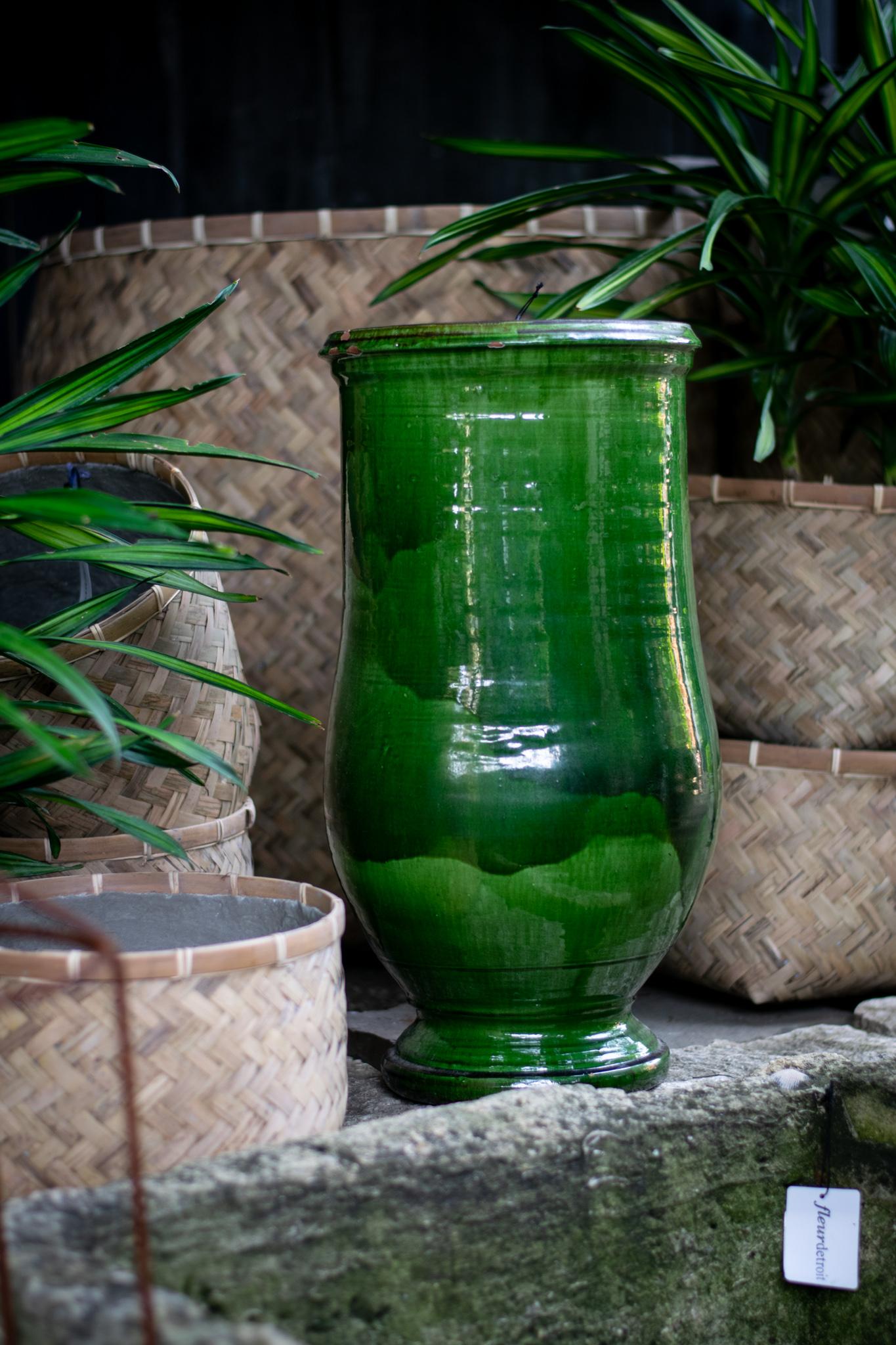 A triumphant nod to old world aesthetic, this contemporary oil jar is a fresh take on the classic look of the French garden. Featuring inconsistencies expected in handmade pottery and a one of a kind glaze in a striking green hue. A perfect addition