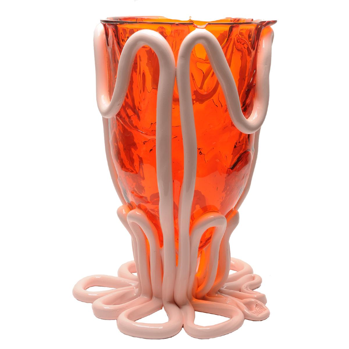 Indian Summer vase, clear orange, matt pastel pink.

Vase in soft resin designed by Gaetano Pesce in 1995 for Fish Design collection.

Measures: XL - ø 30cm x H 56cm.

Other sizes available.

Colours: clear orange, matt pastel pink.

Vase in soft