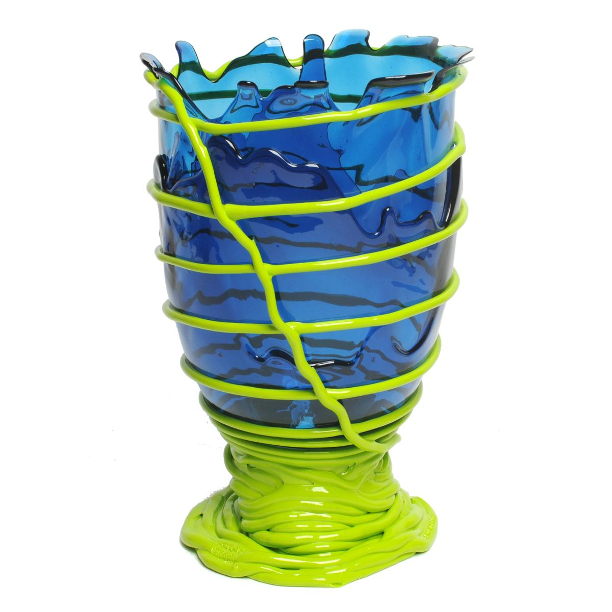 Pompitu II vase, blue, acid green.

Vase in soft resin designed by Gaetano Pesce in 1995 for Fish Design collection.

Measures: M ø 16cm x H 26cm

Other sizes available

Colours: Blue, acid green.
Vase in soft resin designed by Gaetano