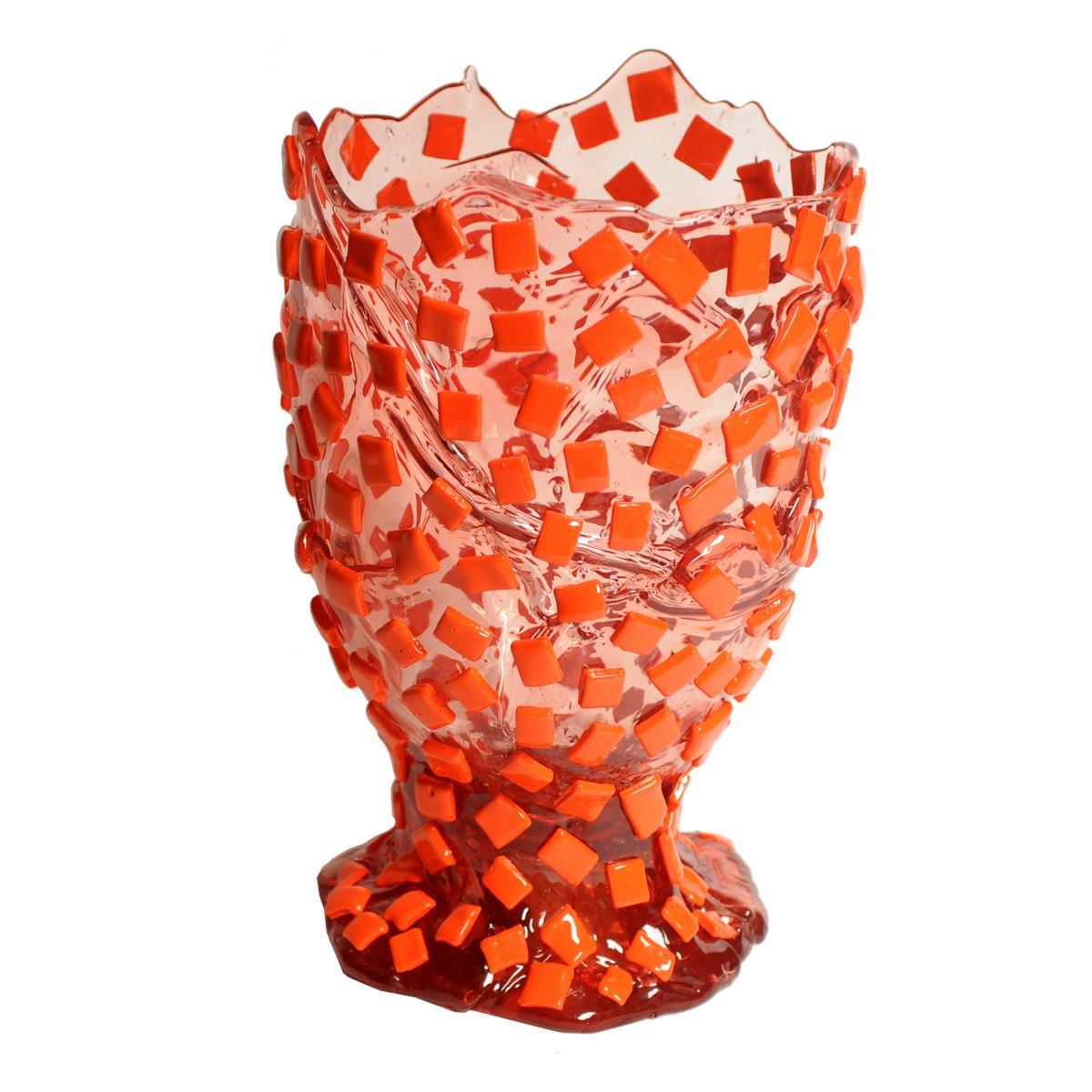 Rock Vase - Clear Antique Pink and Matt Orange

Vase in soft resin designed by Gaetano Pesce in 1995 for Fish Design collection.

Measures: M - ø 16cm x H 26cm

Dimensions Available:
S - ø 10.5cm x H 19cm
M - ø 16cm x H 26cm
L - ø 22cm x H