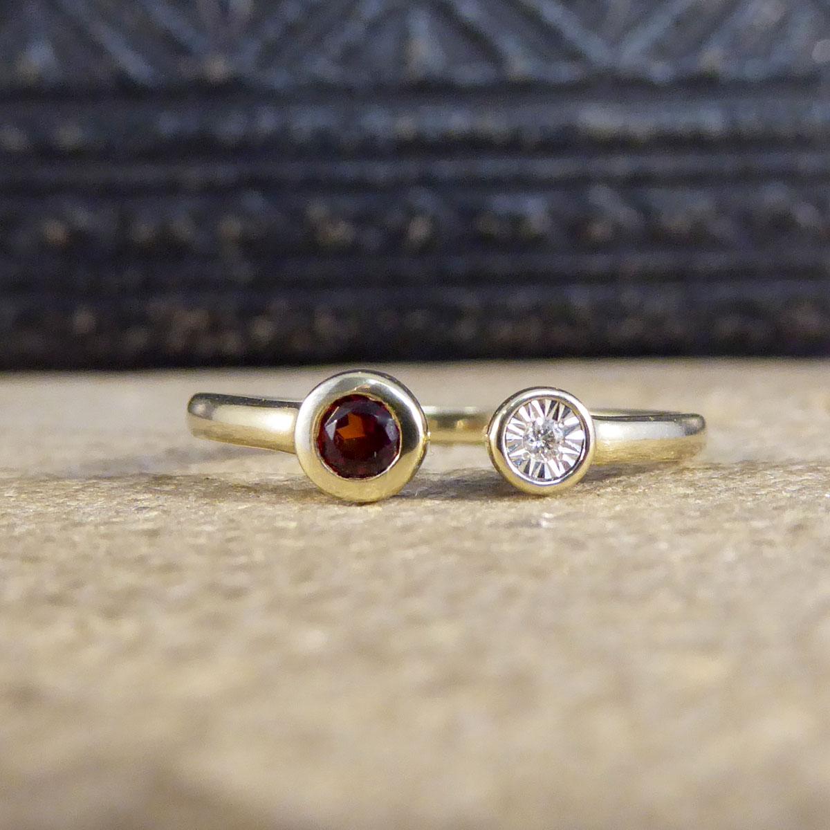 Such a beautiful torque ring featuring a Garnet and Diamond. The Diamond itself is a 1pt stone in an illusion setting giving it the look of a larger Diamond in a rub over collet. The Garnet shows such a beautiful and bright red colour set in a rub