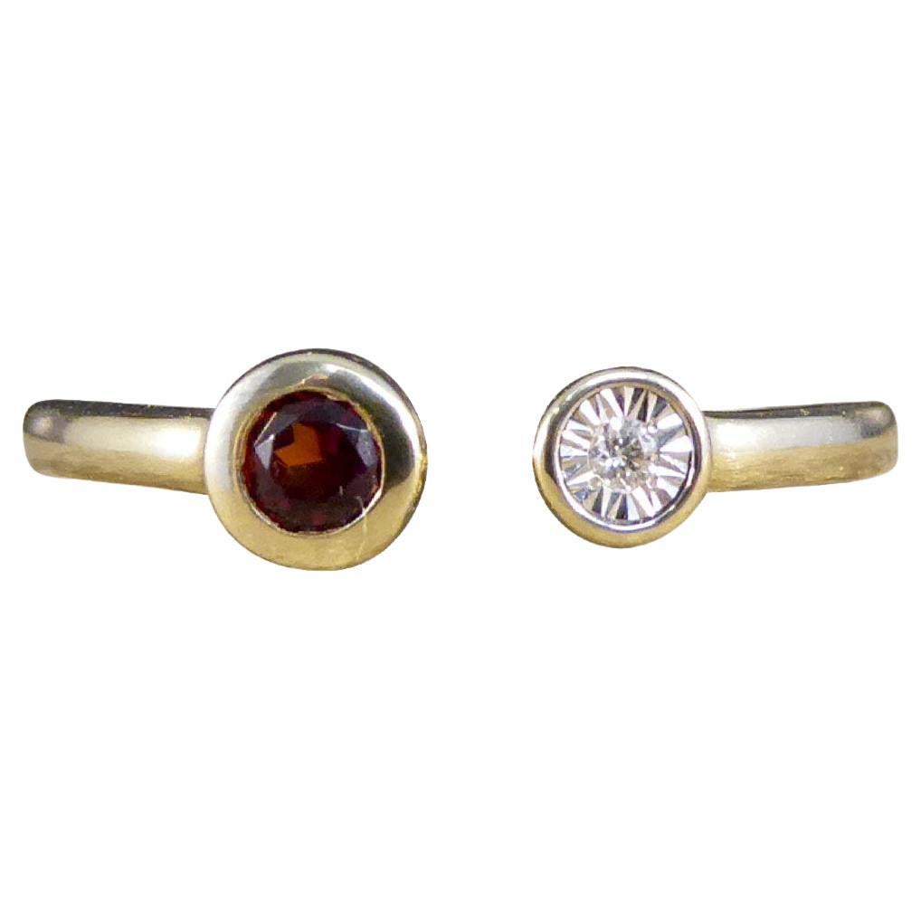 Contemporary Garnet and Diamond Illusion Set Torque Ring in 9ct Yellow Gold