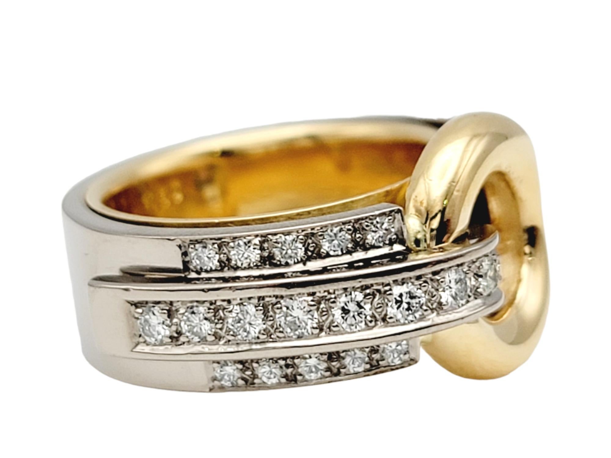 Ring size: 4.5

Sleek, contemporary band ring in a polished two tone design. This unique ring is sure to impress with its clean lines and modern elegance.

This stunning piece has a bold asymmetrical design. An open circle sits at the center of the