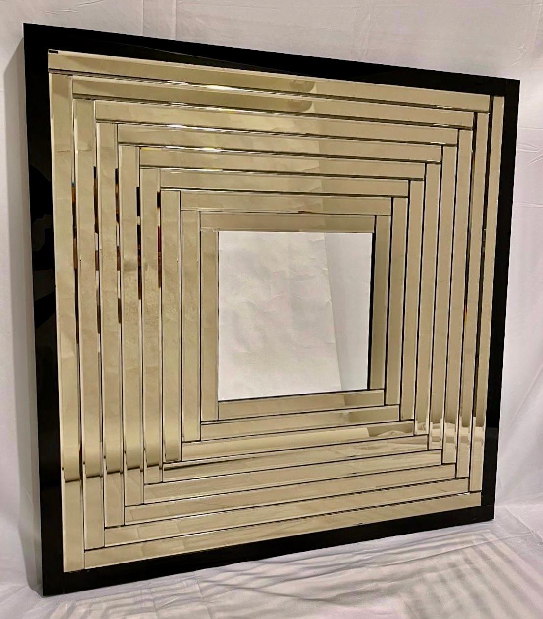 A Minimalist elegant sculpture mirror, entirely handcrafted in Italy, executed as a Work of Art, highest quality of construction and attention to details: eight gradient frames in mirrored Murano glass with a sophisticated rose pink smoked bronze