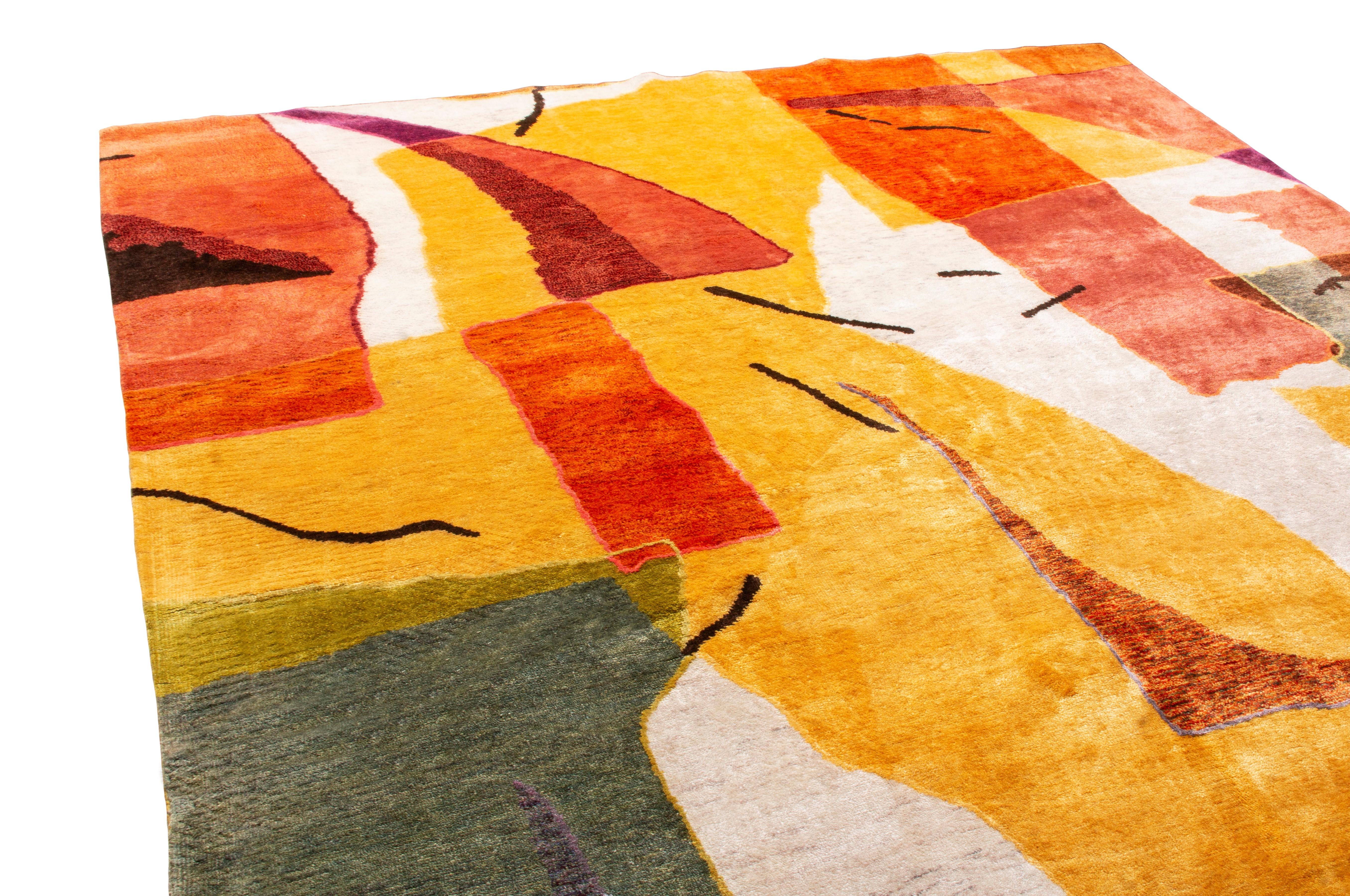 Originating from India, this contemporary rug embodies its own individualistic resemblance to an abstract painting. Hand knotted in high quality wool and luminous silk, the distinct combination of yellow, orange, white, deep green, purple, and