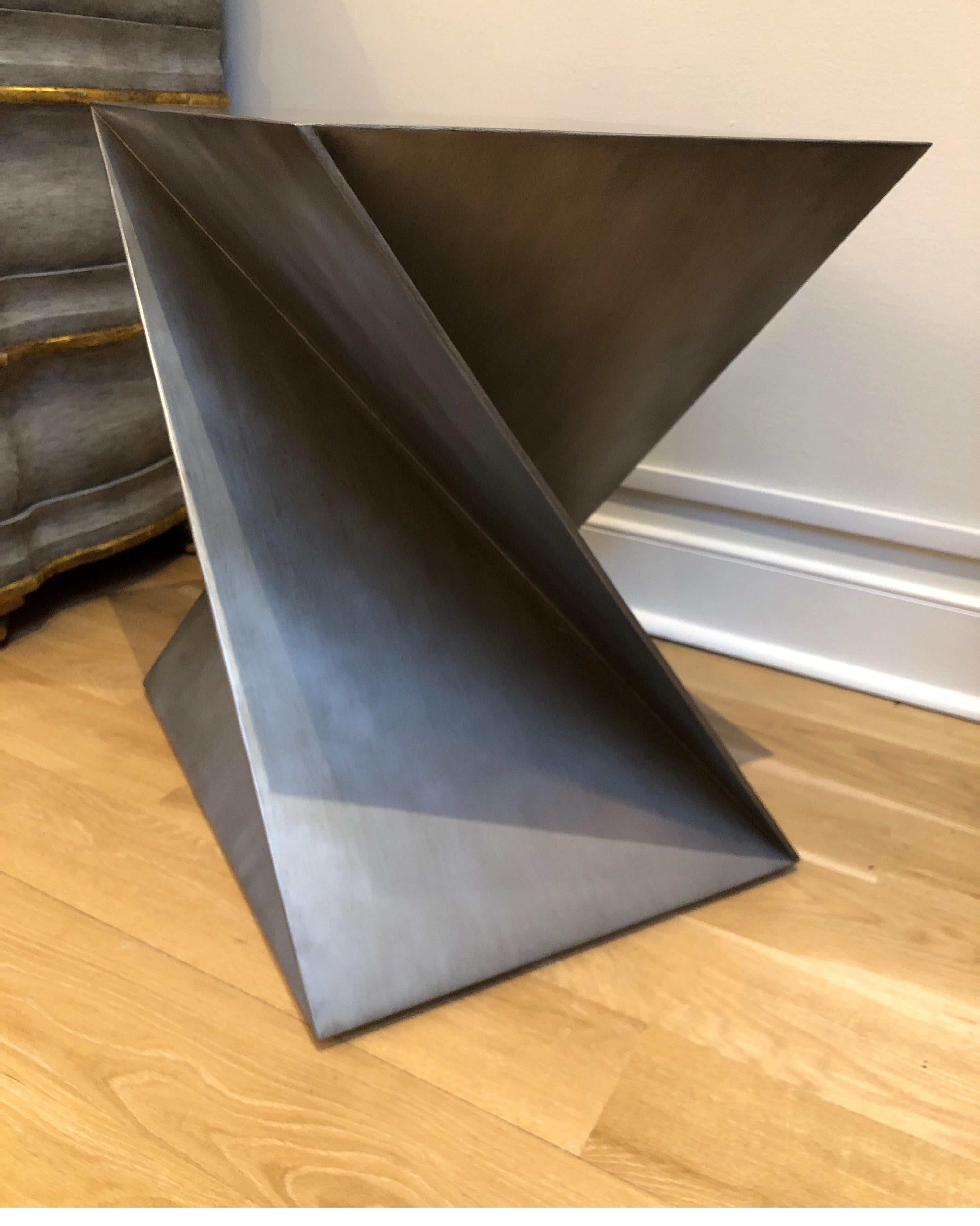 Solid metal contemporary side table with geometric shape.
Perfect condition.
Style of Mathieu Mategot.