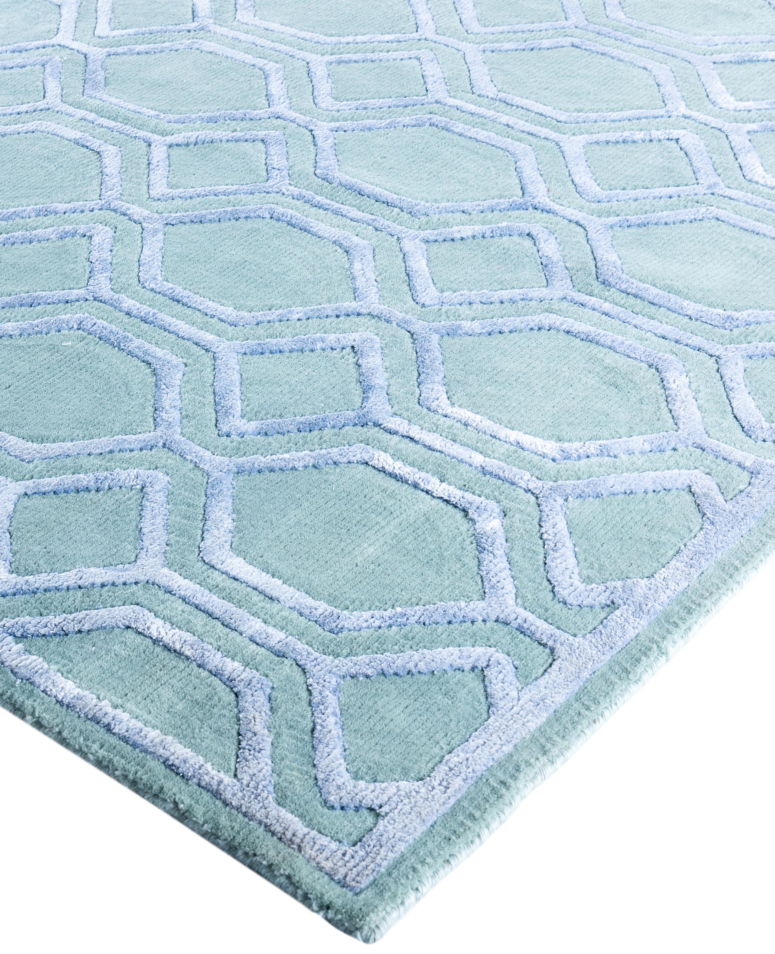 Fresh, spirited, and above all, luxurious, the rugs of the Modern collection can invigorate a traditional room as gracefully as they can ground a more contemporary space. The opulent pattern in this rug is derived from the rich tradition of Turkish