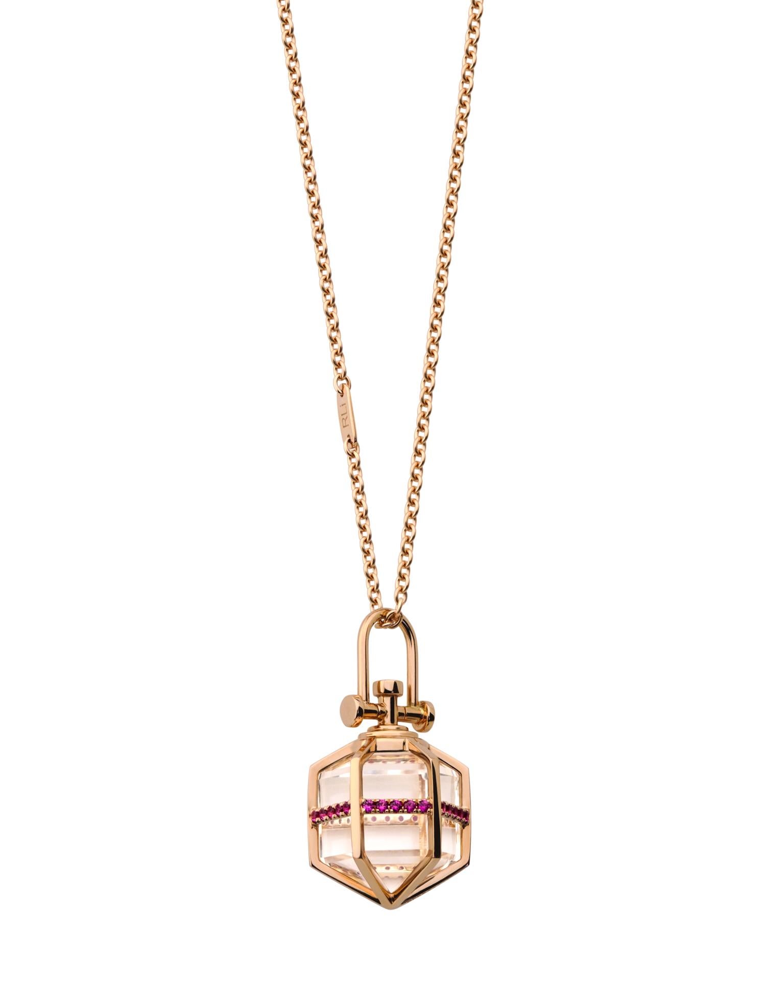 Rebecca Li designs mindfulness.
This elegant 18k rose gold necklace is a talisman for Success and Wealth. Wear it to always be in the right place at the right time. 

Talisman Pendant :
18k rose gold.
30 pieces small natural ruby.
Natural clear rock