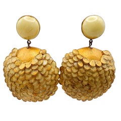 Boucles d'oreilles contemporaines en forme de cercle fleuri doré