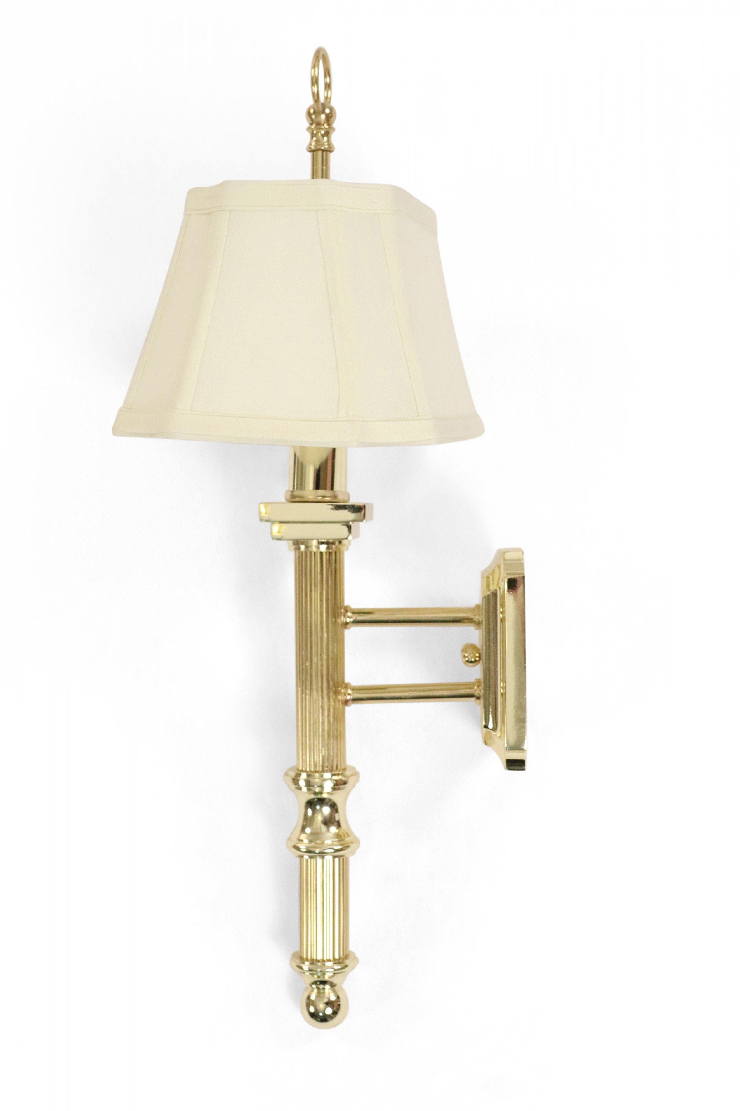 Contemporary polished brass finish wall sconce with grooved detail and beige fabric shade. (Similar sconces: 062597, 062597B)