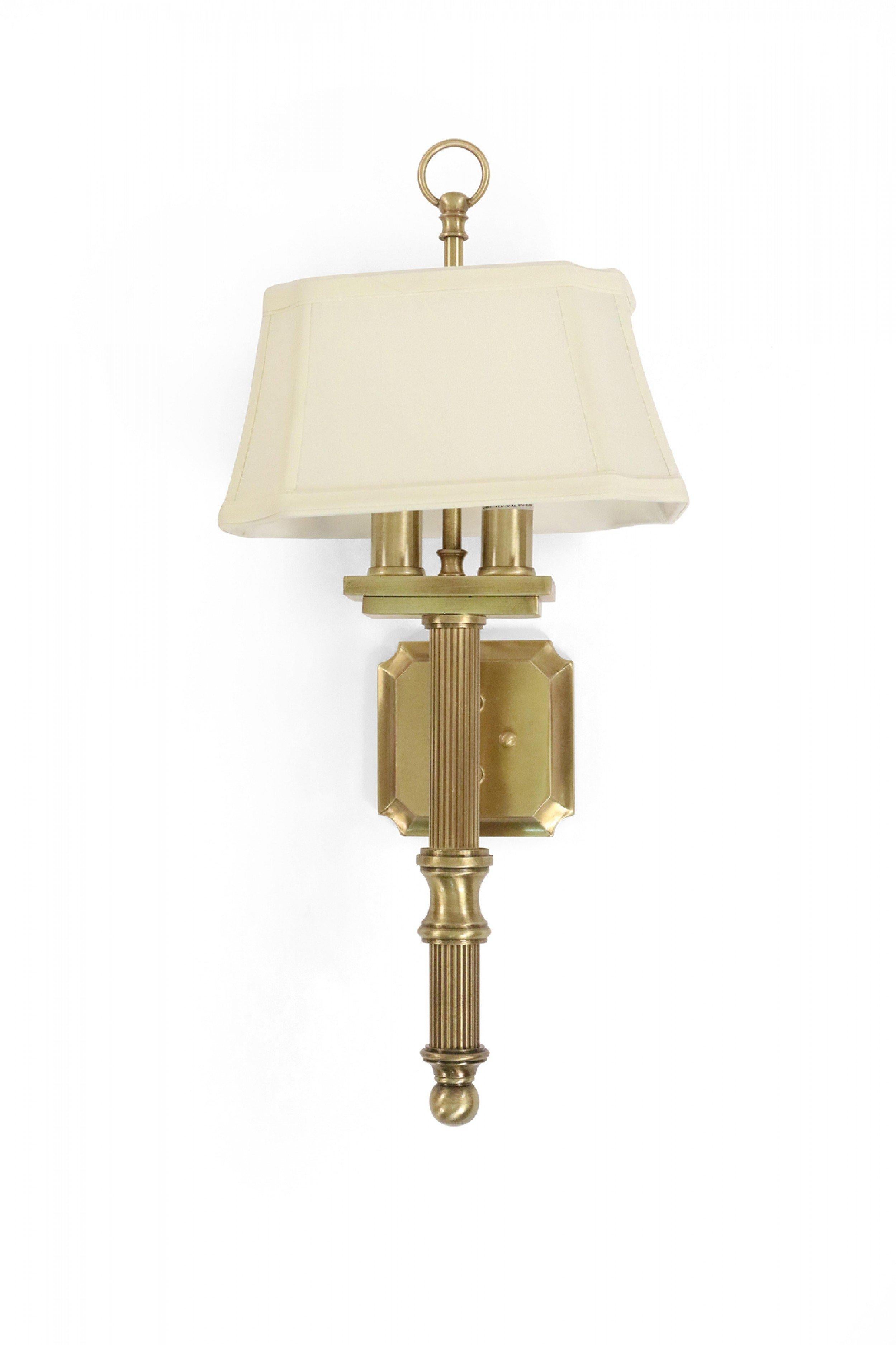 8 Contemporary matte brass finish wall sconces with grooved detail and beige fabric shades (PRICED EACH).
 