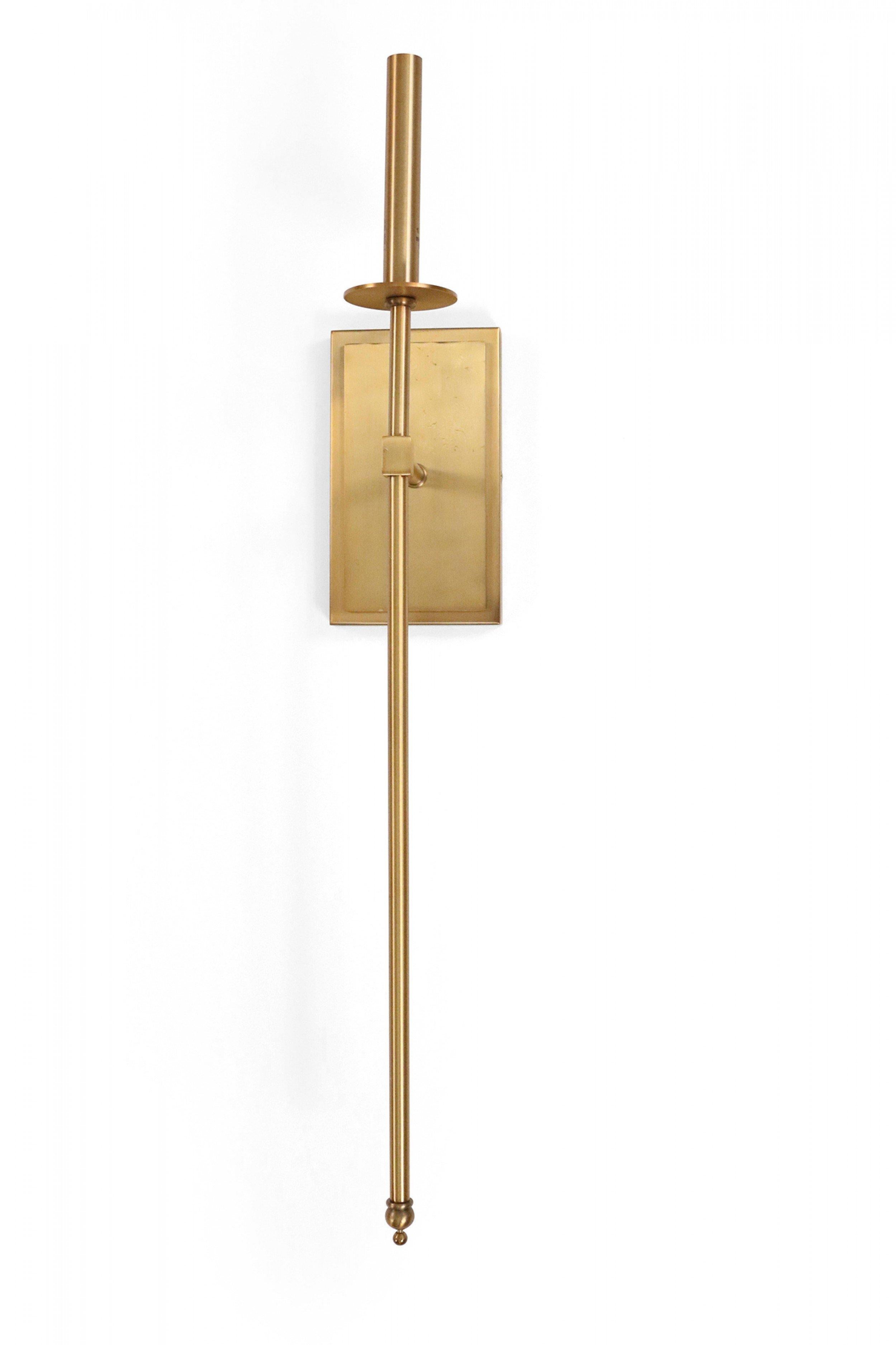 8 Contemporary matte brass finish wall sconces with extended torch bodies and beige fabric shades. (priced each).
    