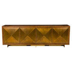 Contemporary Gilt, Wood, and Brass Faceted Front Sideboard