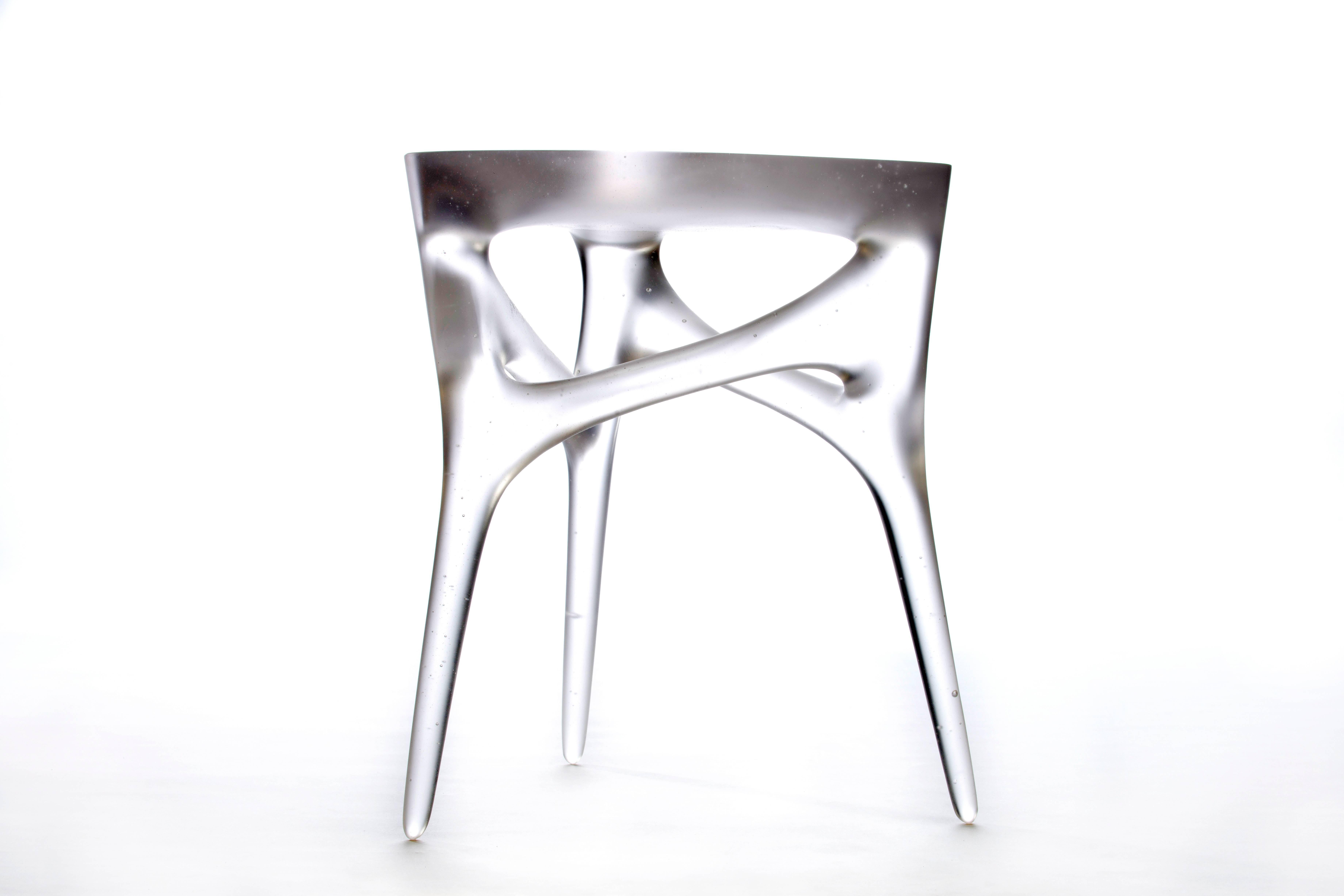 Exquisite cast glass side table by German artist and designer Timothy Schreiber. 

This table is made to order and available in either frosted or clear glass finish.