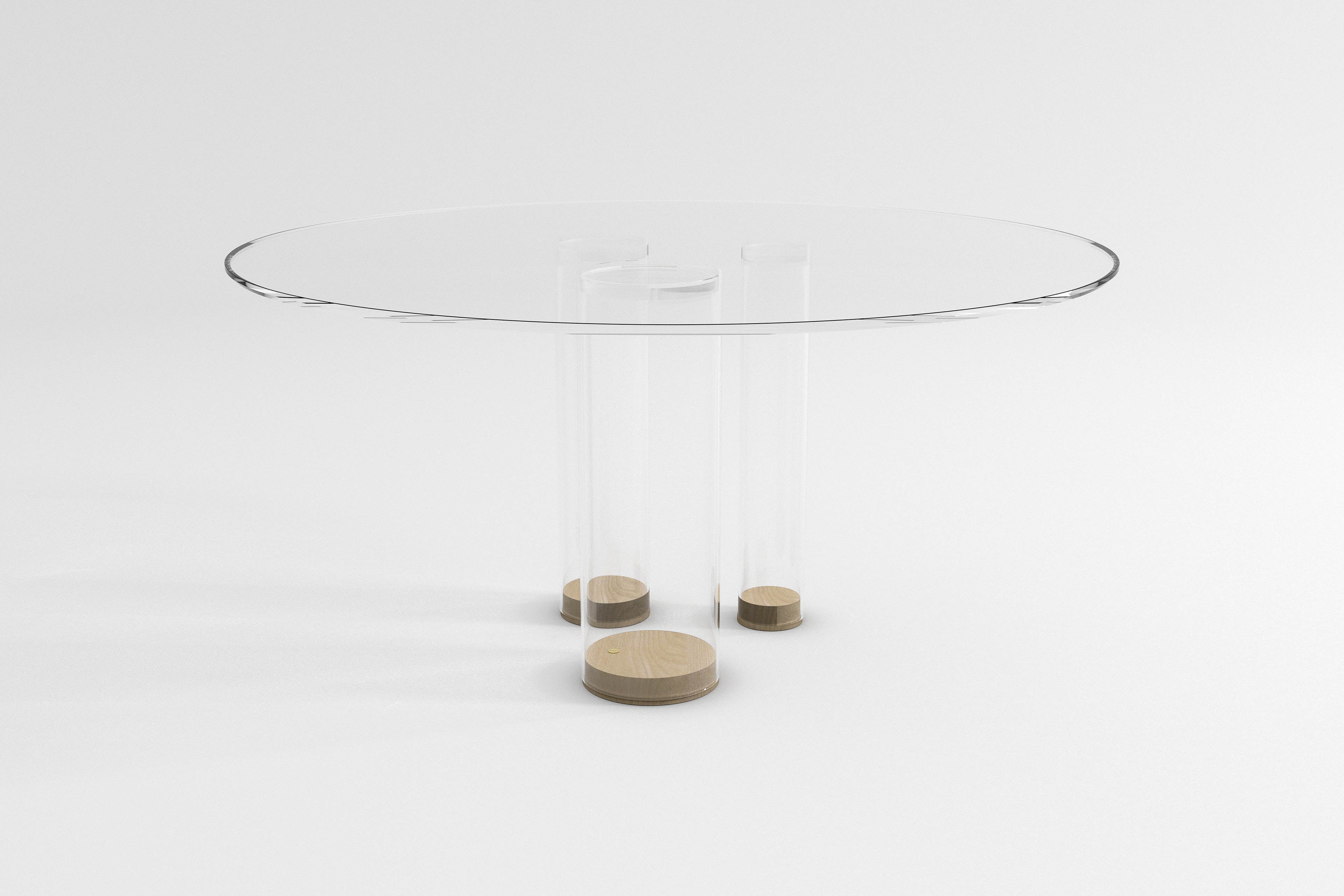 Tubular is the ultimate decorative table. Its presence in the room is subtle. It enhances the other objects in the room and at the same time offers beauty to whomever can catch its eye. The top and legs are made entirely of glass, but tubular can be