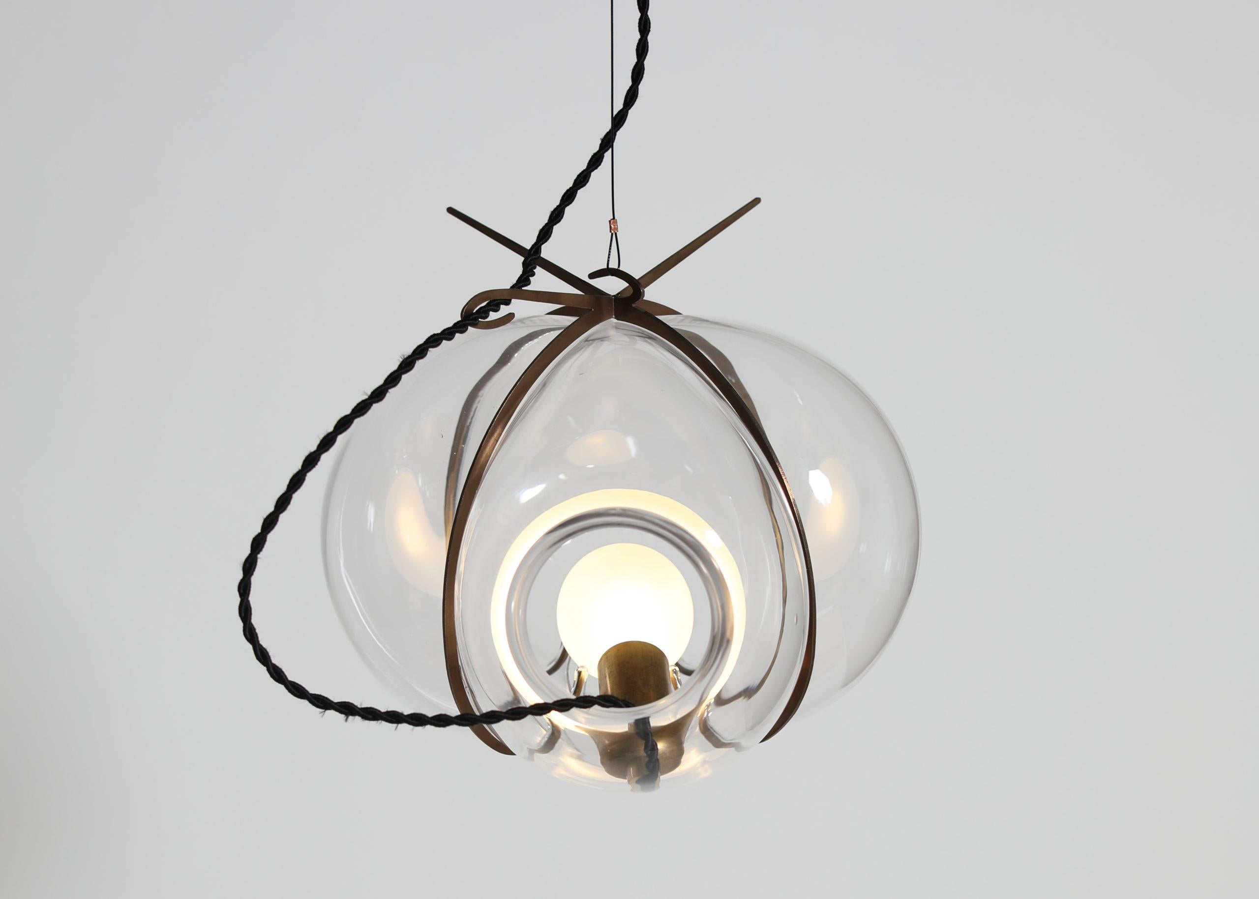 Contemporary glass pendant light - Exhale by Catie Newell / Wes McGee for WDSTCK

Design: Catie Newell / Wes McGee
Material: Crystal glass / stainless steel

Dimensions: Diameter 30 cm

Handcrafted in The Netherlands

Exhale skillfully