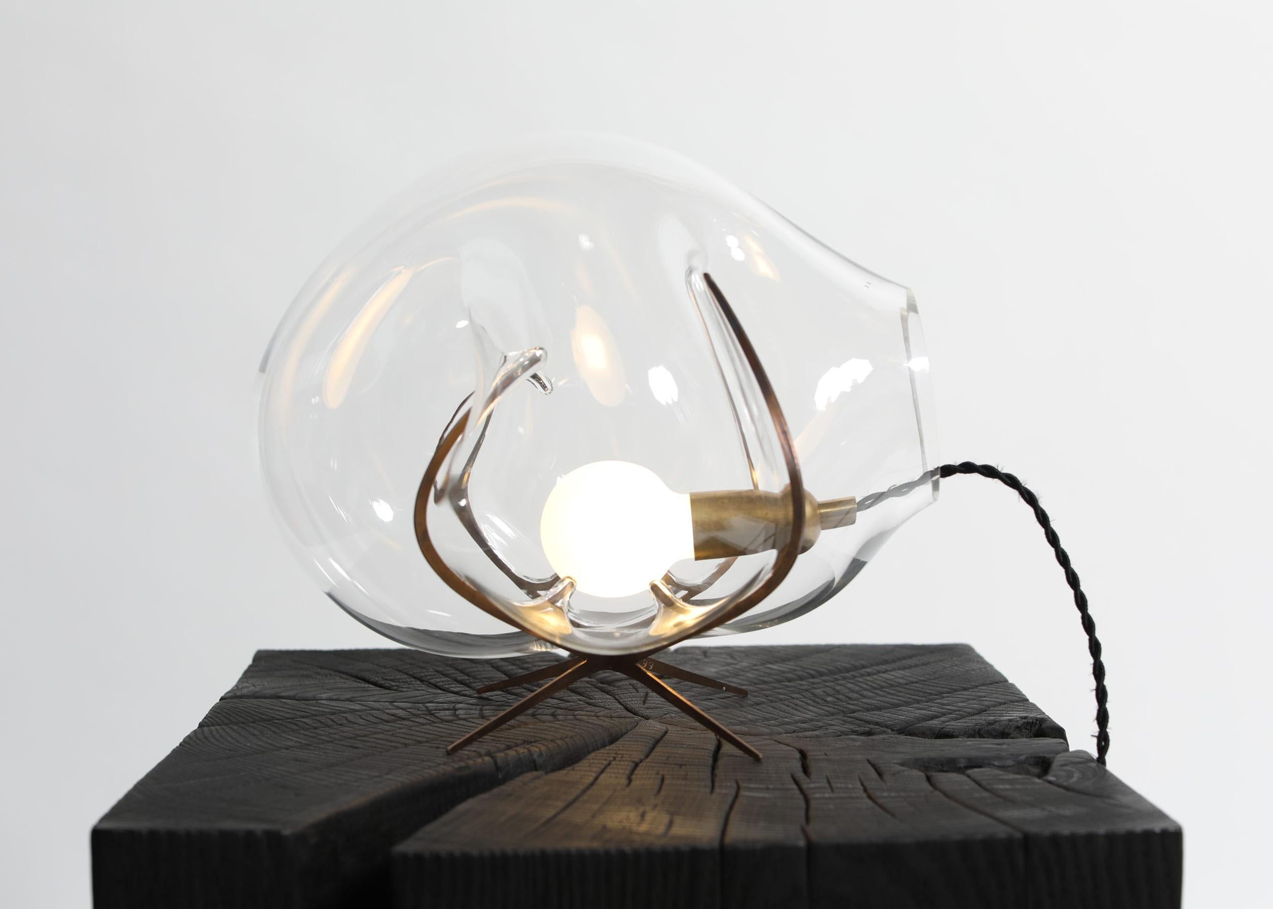 Contemporary glass table light - Exhale by Catie Newell / Wes McGee for WDSTCK

Design: Catie Newell / Wes McGee
Material: Crystal glass / stainless steel

Dimensions: Diameter 30 cm

Handcrafted in The Netherlands

Exhale skillfully