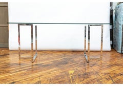 Tavolo da pranzo o da scrittura contemporaneo con piano in vetro e cromo