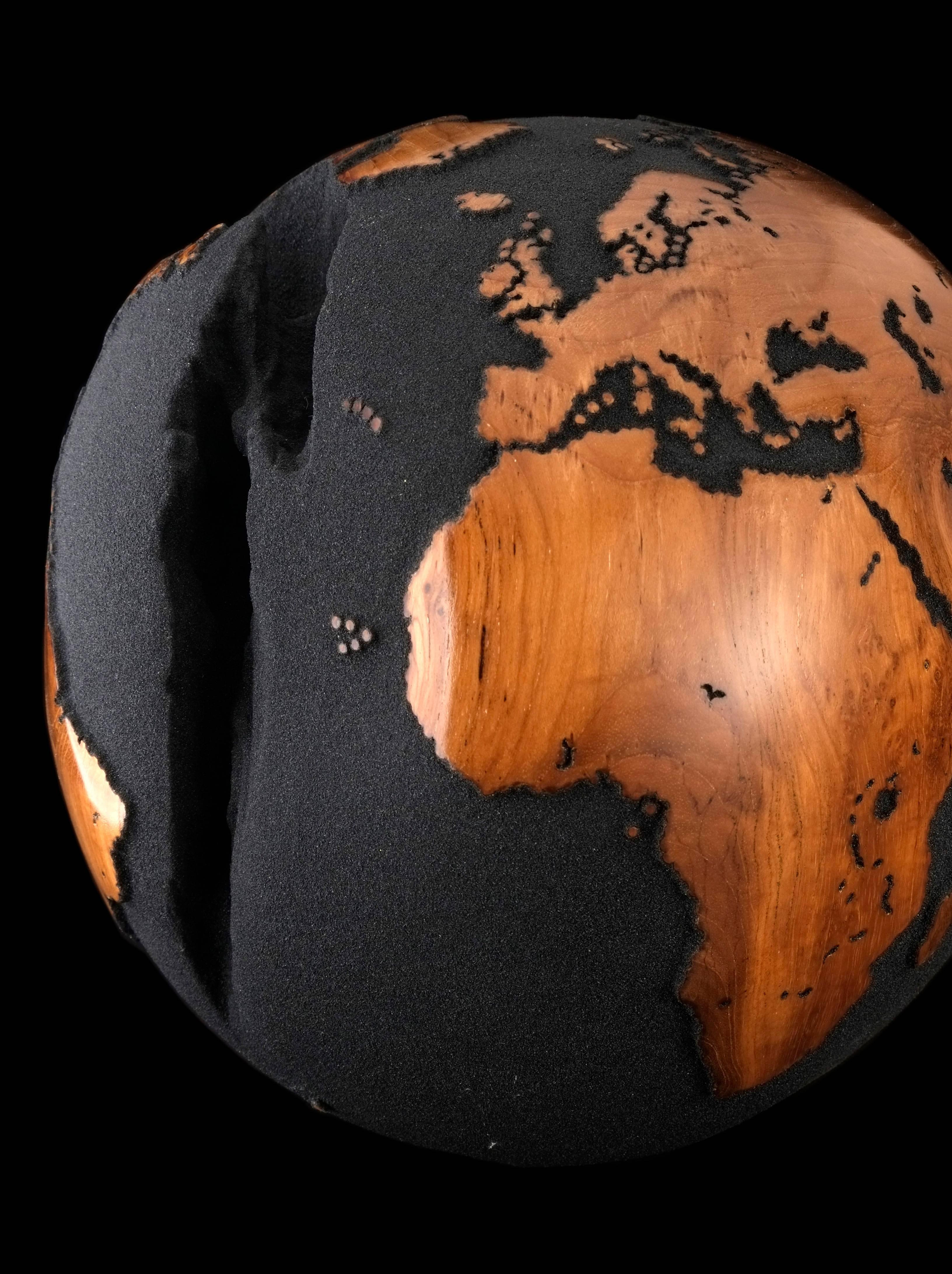 Balinese Contemporary Globe in Teak Root with Volcanic Sand and Natural Holes For Sale