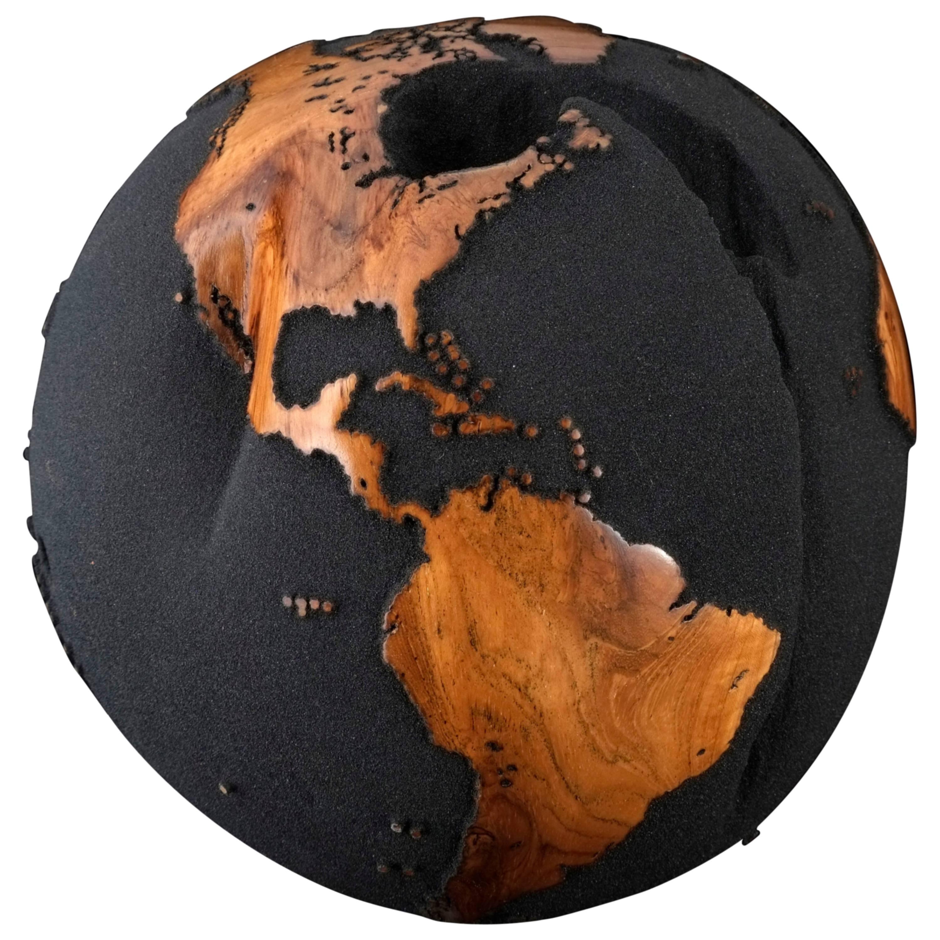 Contemporary Globe in Teak Root with Volcanic Sand and Natural Holes For Sale