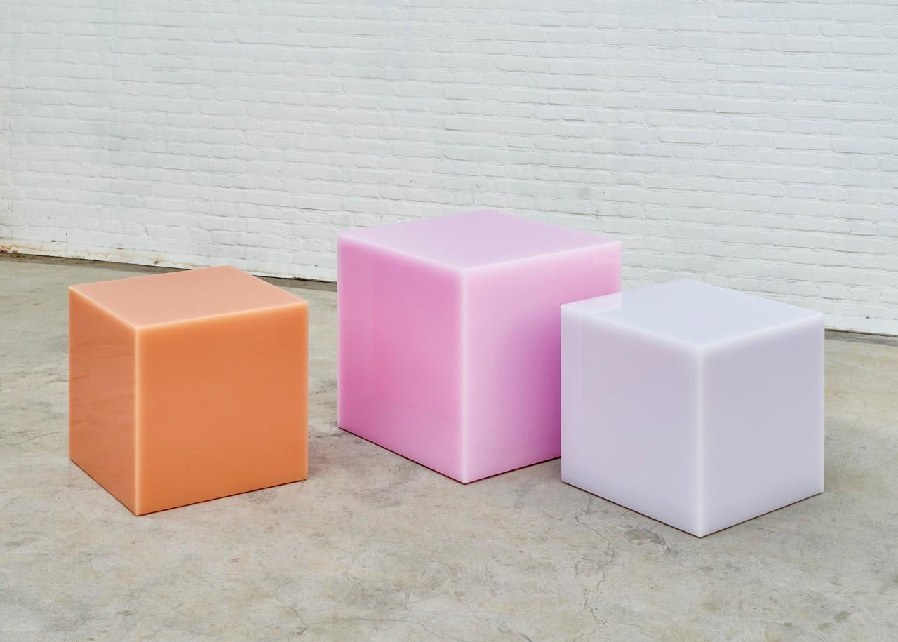 Seemingly solid objects with a magical glowing edge. The unique translucent and highly polished properties of the material give a magical effect to these multifunctional pieces.

Color: Peach (pictured) Measures: 60 x 60 x 60 cm

Colours: Raspberry,