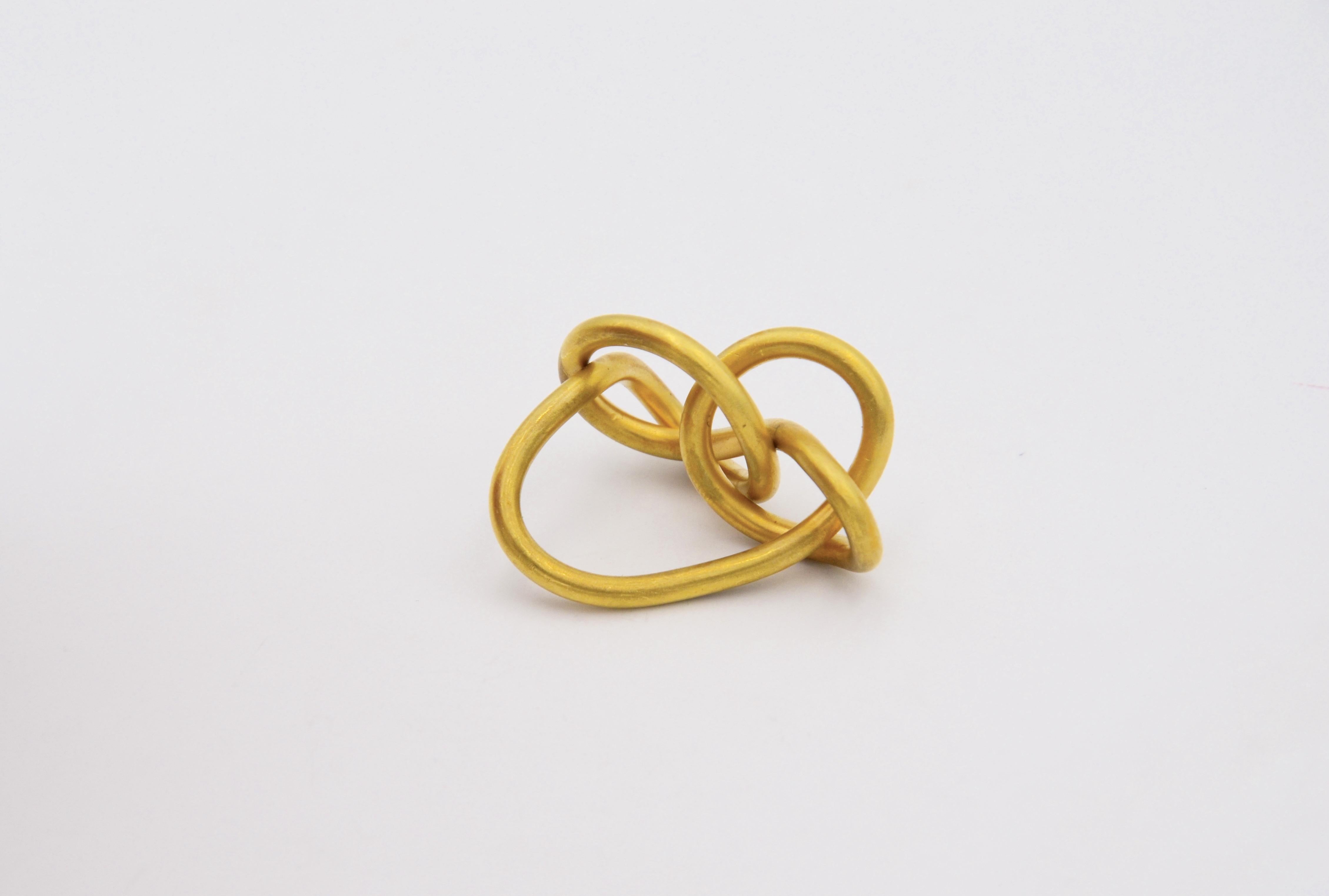 Contemporary Gold plated Cocktail Ring

A contemporary piece of art, jewelry as a wearable object. Knotted, interwined and harmonious balance is what this design is all about. 

This one-of-a-kind piece can be customized in other materials like 18
