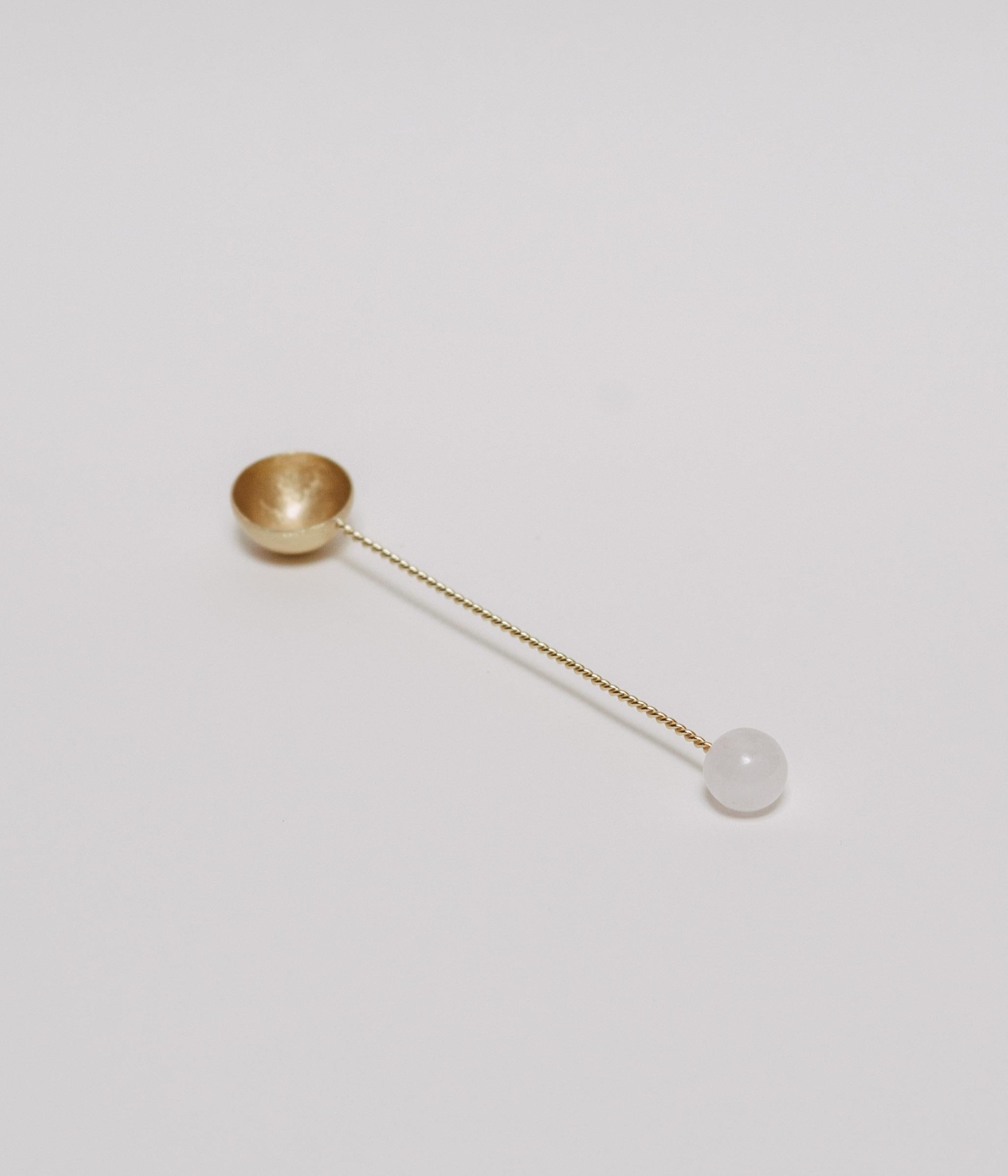 Elevate your morning coffee or tea ritual with our torch spoon, meticulously handcrafted in Italy by skilled artisans. Fashioned from metal and plated brass, each spoon features a hand-carved stone adornment adding a touch of jewelry-inspired