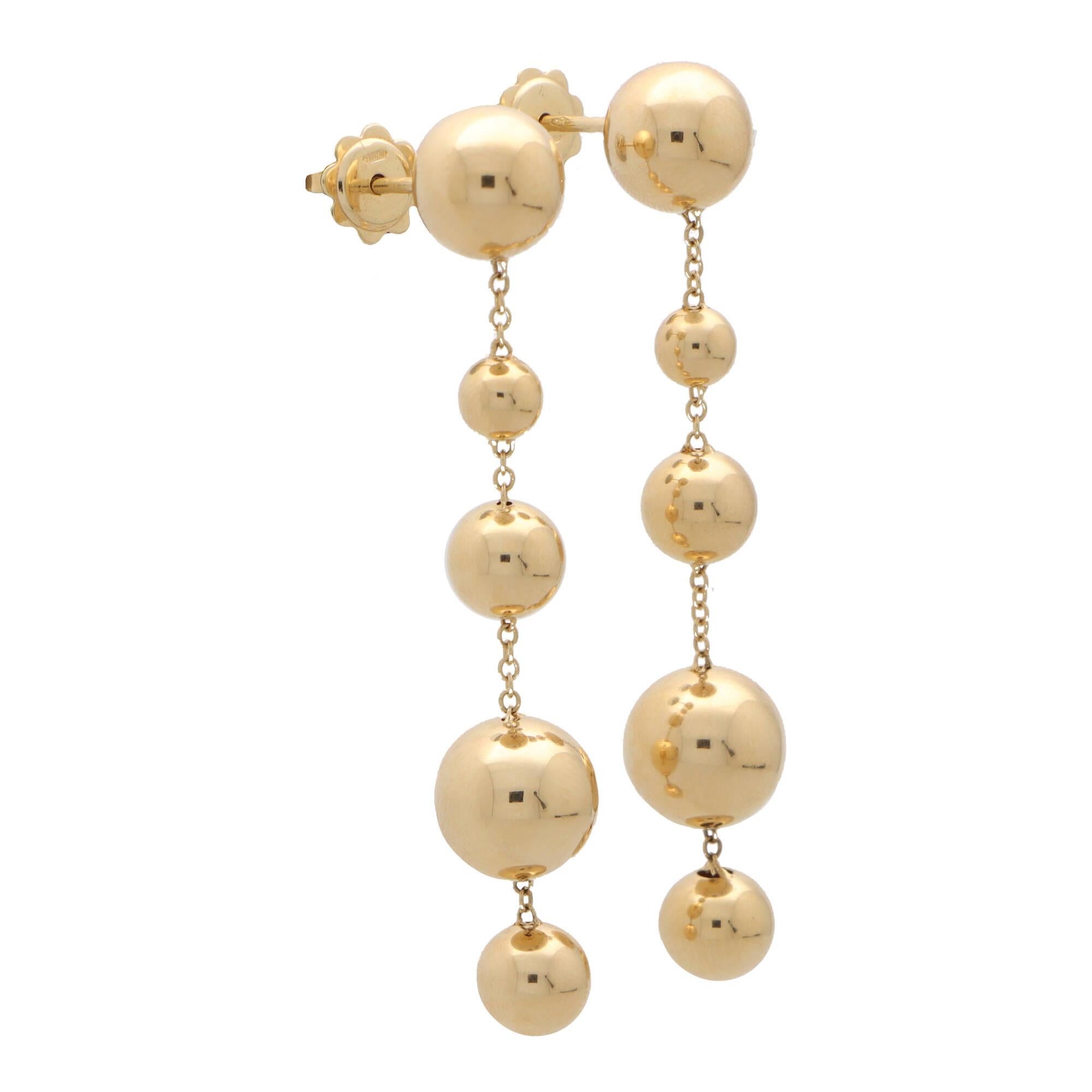 gold drop ball earrings