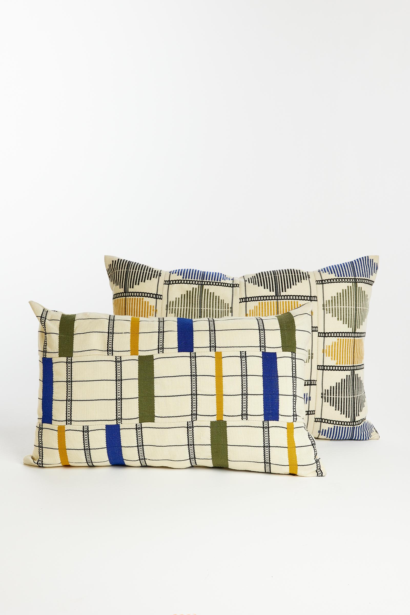 Woven Kente cushion Rhythmic: 
Beautifully Striped
Colours: Herb Indigo

One of our favourite repeat patterns is stripes, what is yours? This luxury geometric hand-woven cushion is woven with two opposing stripes, vertical and horizontal. The