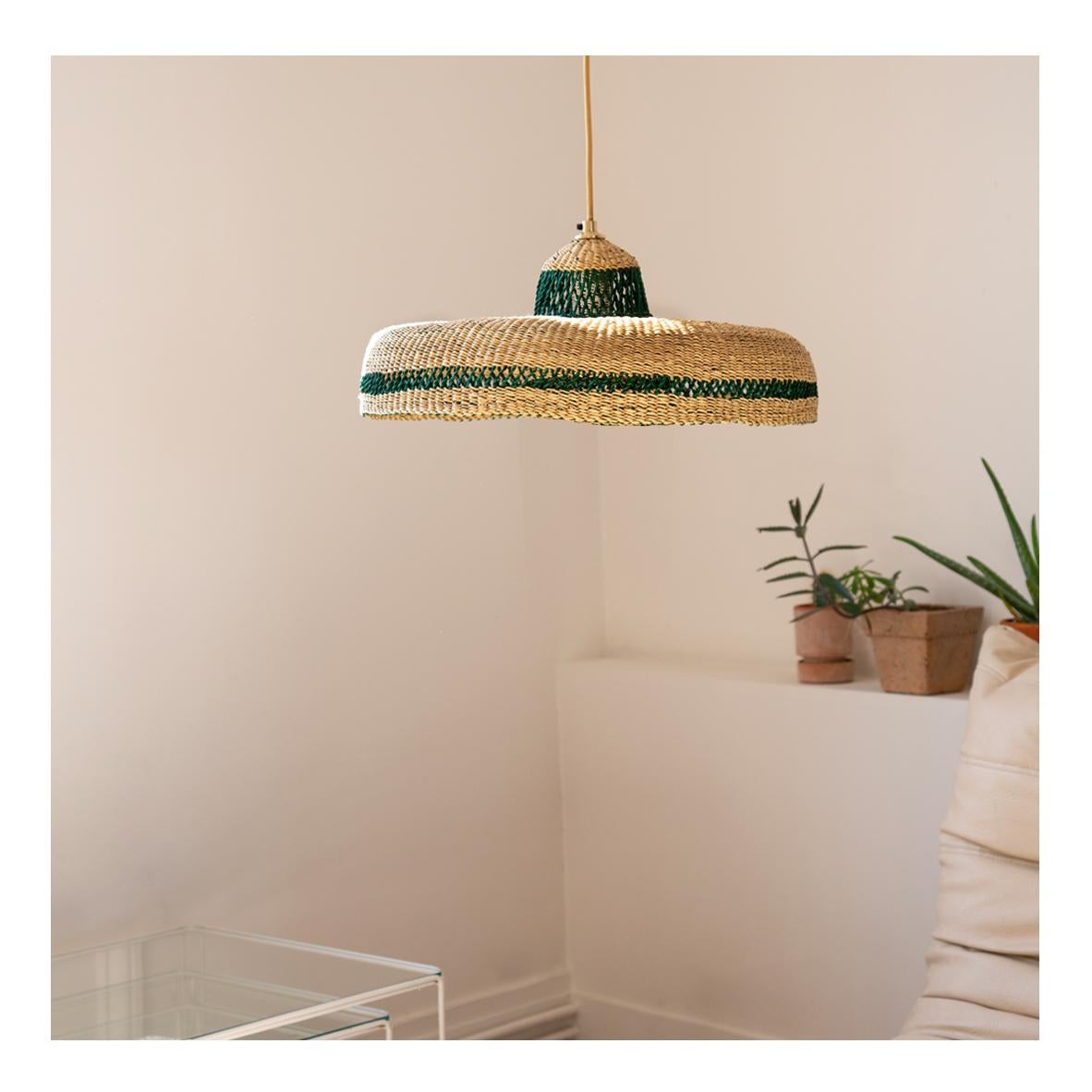 Medium Woven Pendant Lamp HATTER : 
Pure natural
Colour: Natural and Herb (Bottle Green)

Are you looking for a modernistic natural hub for your room? We can offer you that with this medium pendant lamp that perfectly balances the earthy,