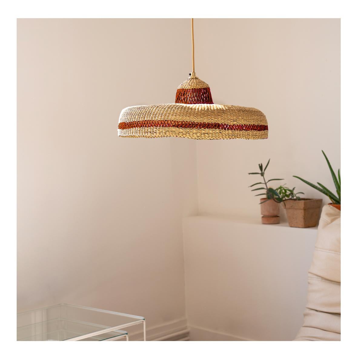 Medium Woven Pendant Lamp HATTER : 
Dynamic and natural
Colour: Natural and Ginger (Terracotta)

Are you looking for a contemporary natural centrepiece for your room? We can offer you the perfect balance of earthy and refined with our medium