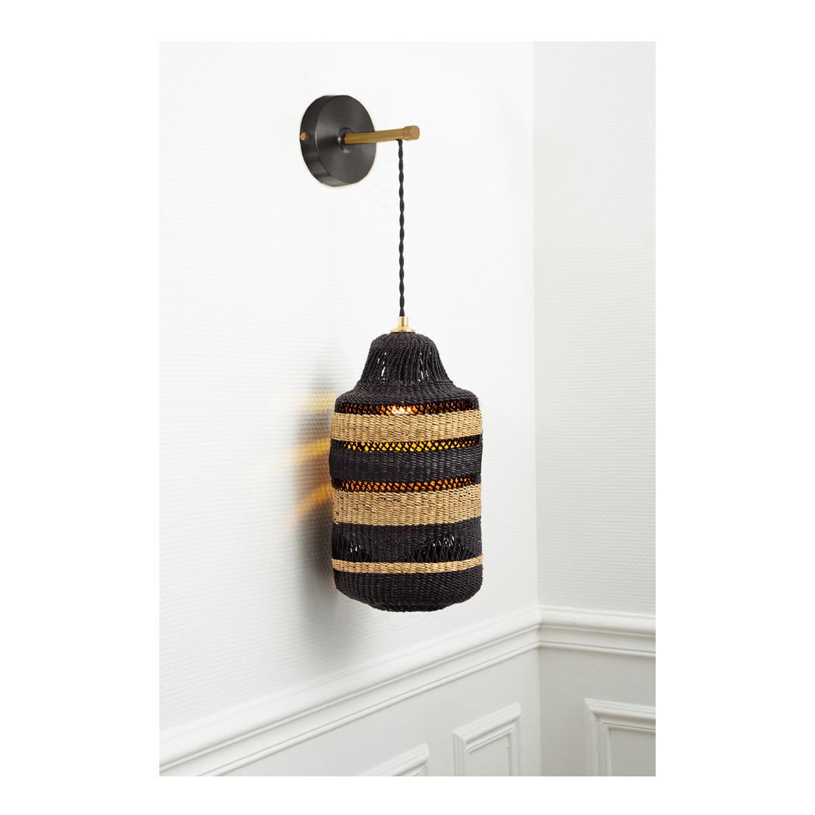 Wall lamp SHADOW : 
Intricately woven
Colour: Natural / midnight (black)

Would you like to enhance your home with natural ornaments? This pendant wall lantern can fill your room with decorative patterns and light it is woven like lace with