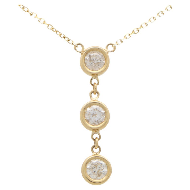 Contemporary Graduating Diamond Pendant Set in 14k Yellow Gold For Sale ...