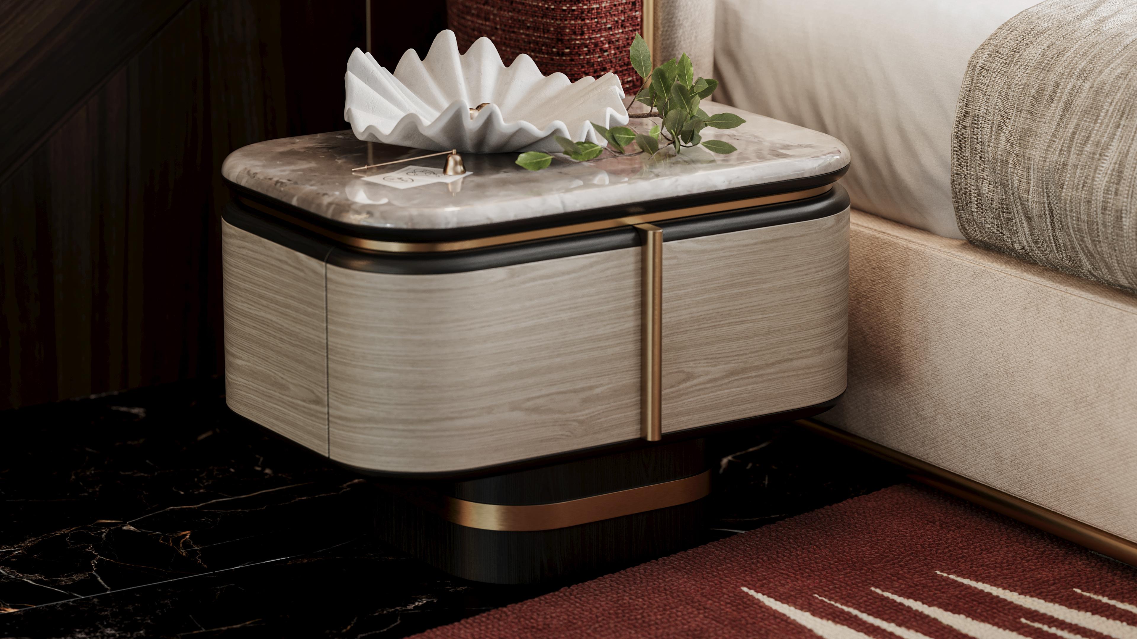 Gralto Black bedside table offers a unique design with a black wood leg with a subtle brass detail, combining warmth with sophistication. It incorporates a light wood finish, black wood accents, and brushed brass details, creating a striking