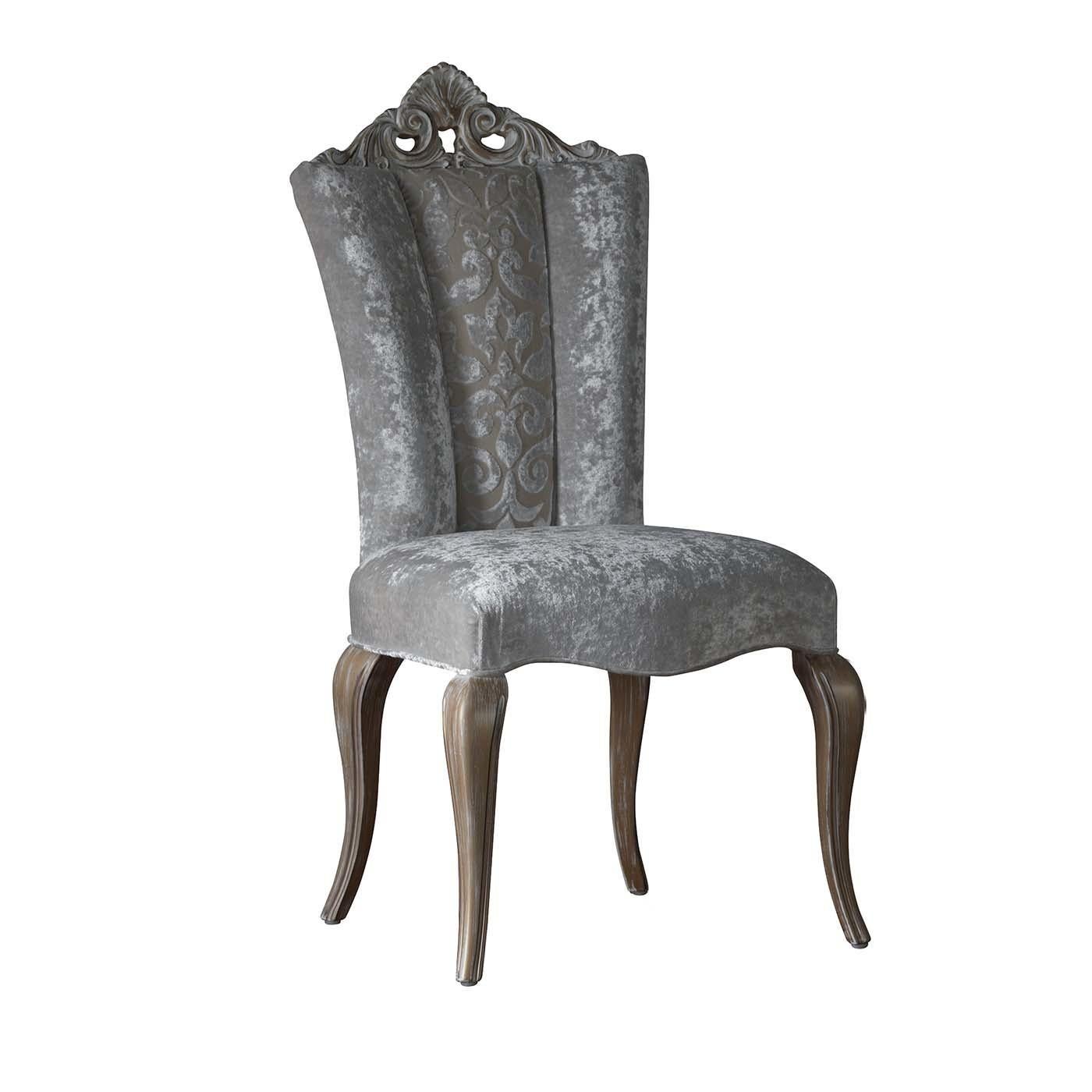 A sophisticated design for this Italian Baroque style dining chair, carved and decorated to become the decor highlight of the dining room or living room. The wooden Queen Anne style legs have a decapè finish for a striking solution. The seat and