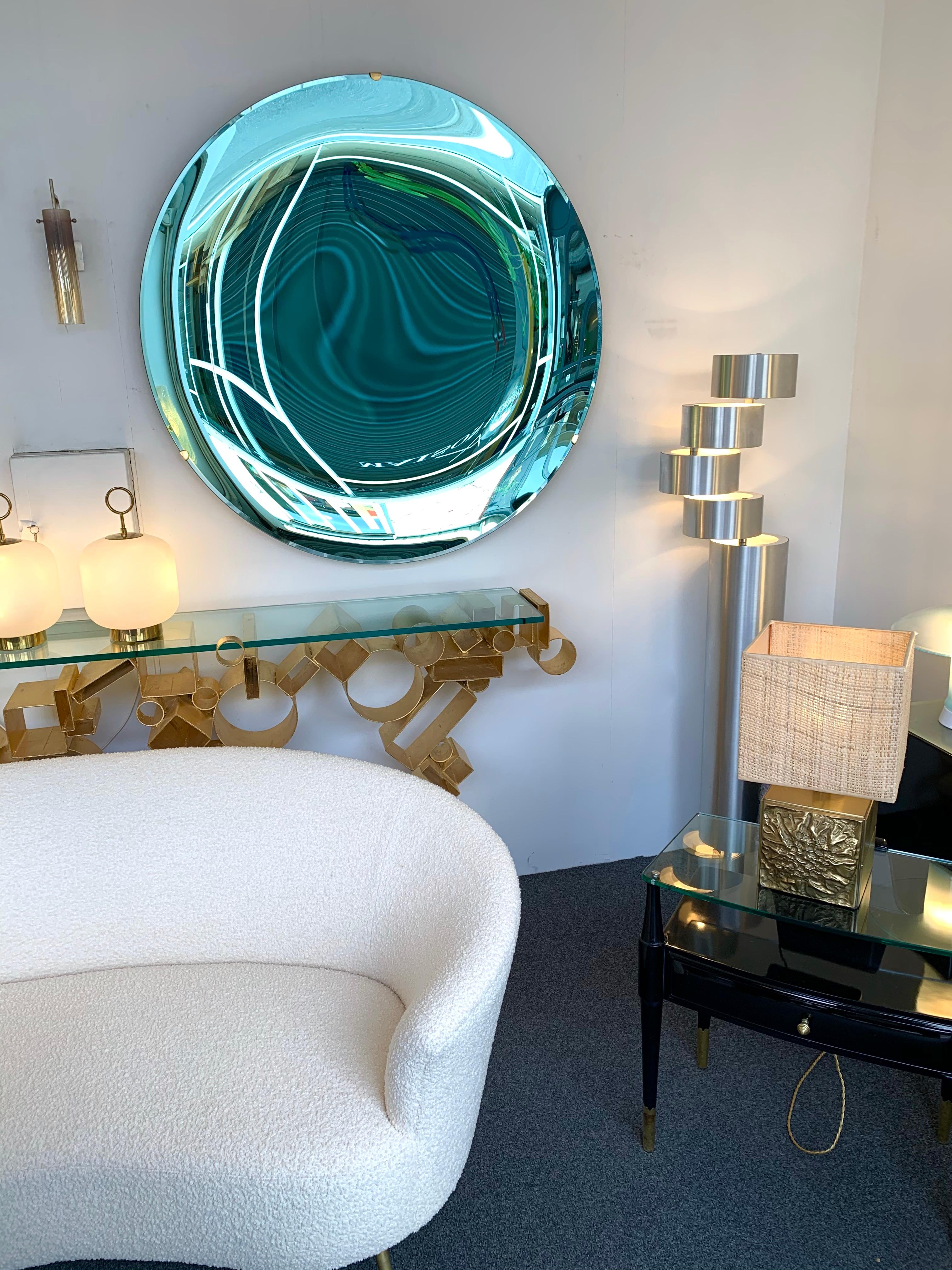 Contemporary curve concave sculpture green wall mirror, brass structure. Artisanal handmade work made by a small italian workshop using the old style mercurization technic. 