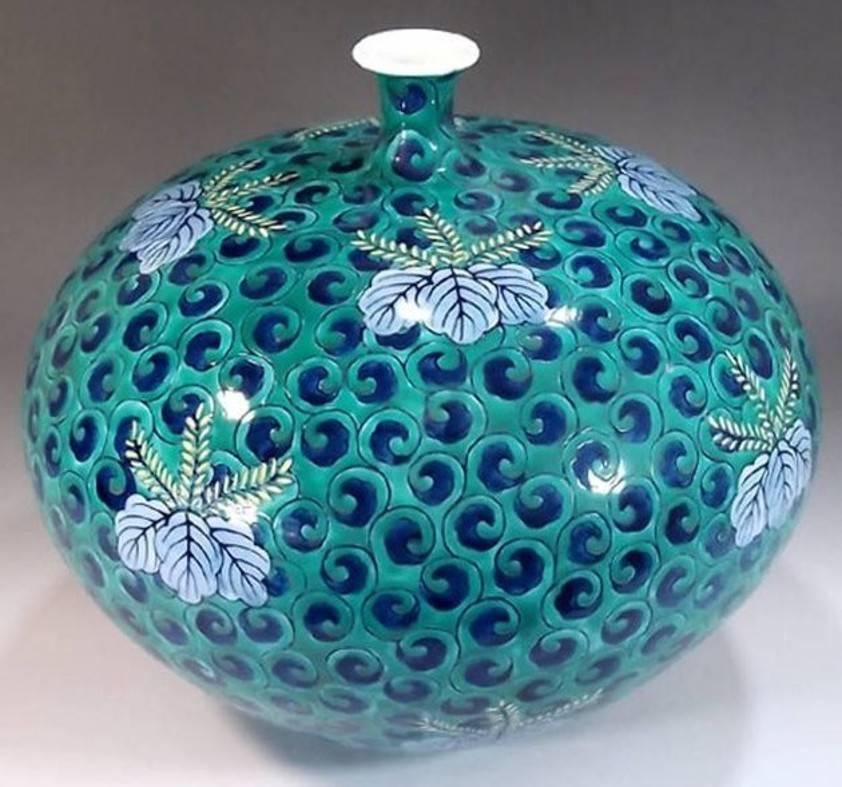 Elegant contemporary Japanese decorative porcelain vase, hand painted in vivid green and blue on a beautifully shaped ovoid porcelain vase, an exceptional piece crafted, hand painted and signed by a widely acclaimed master porcelain artist of