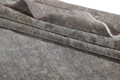Contemporary gray overdyed wool room-size rug.