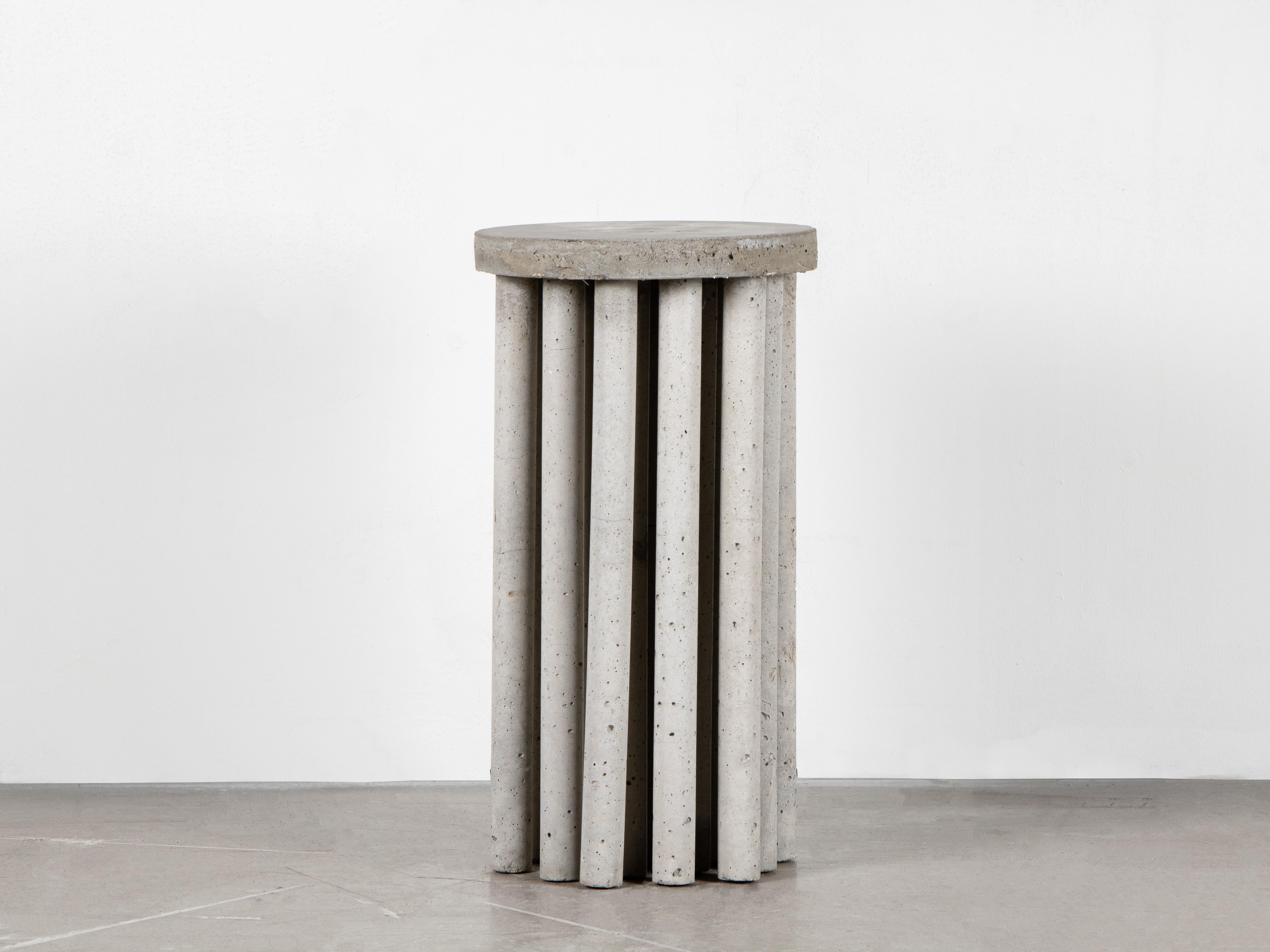 Contemporary grey side table in concrete - Pale Plinth by Lucas Morten

2021
Limited edition of 23 + 1 AP
Dimensions (cm): 30 H 56
Material: sculpted in raw concrete

With elements fetched by the architectural era brutalism combined with a
