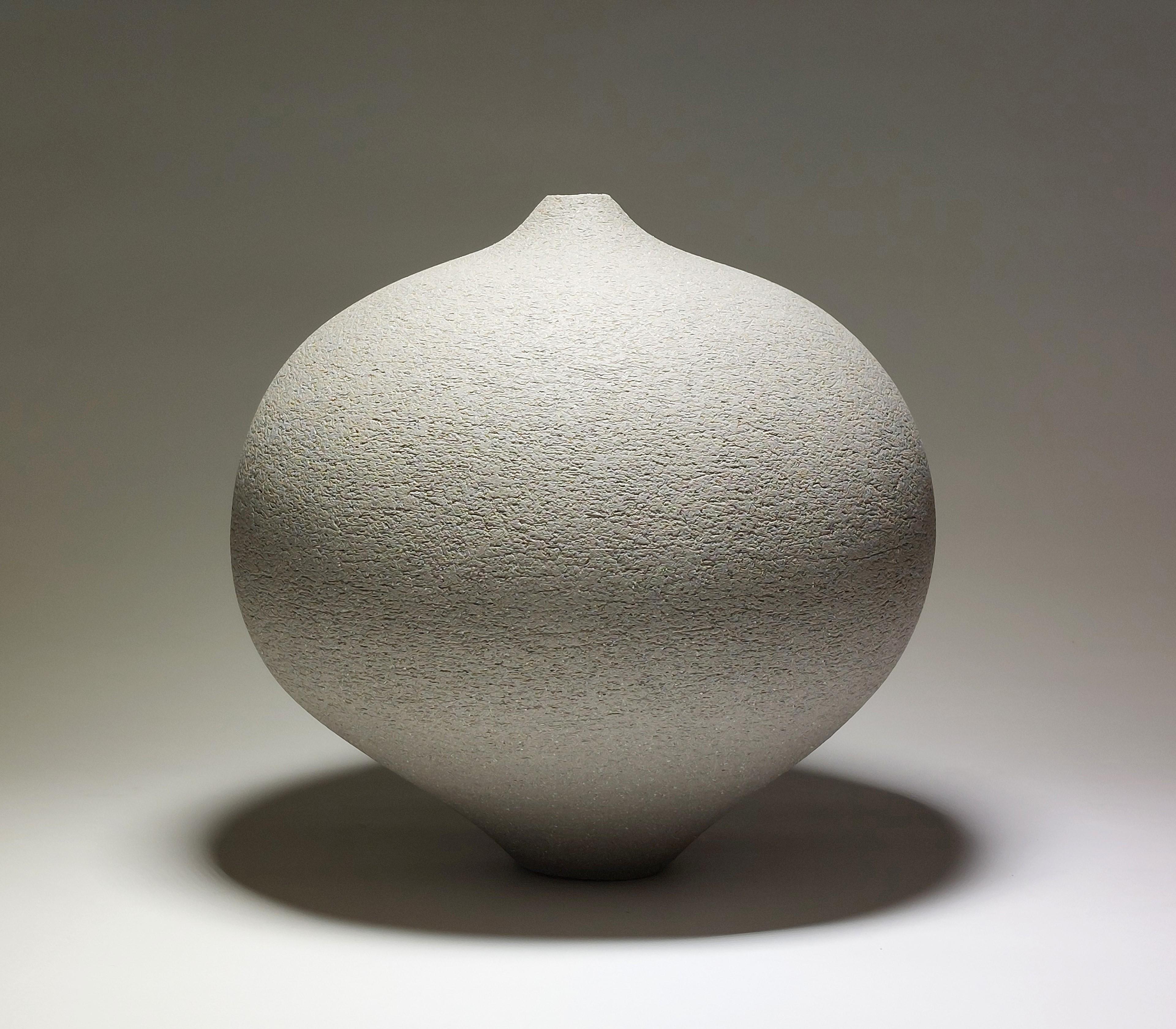 Contemporary Grey Stoneware Ceramic Vessel by Rachel Peters, Medium, In Stock.

This vessel has been hand built from Rokk Grey Stoneware Clay using the traditional method of coiling.   Refined and finished by hand to create a beautiful tactile