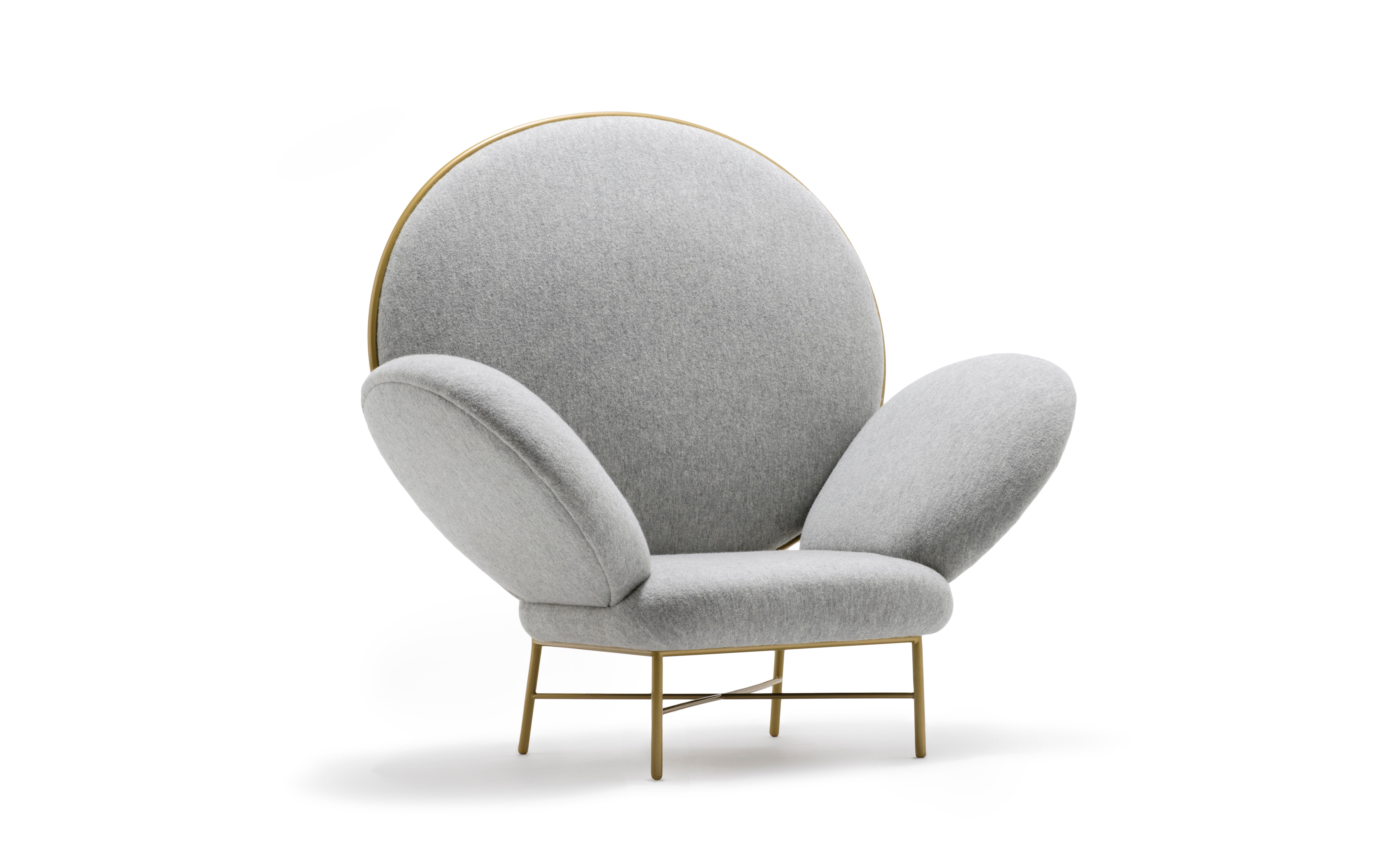 Contemporary ivory upholstered armchair - stay Armchair by Nika Zupanc for Se.

Design: Nika Zupanc
Frame upholstered in Holland & Sherry Chamonix (Color Smoke) fabric. Available also in a choice of leathers or fabrics, or in customer’s own