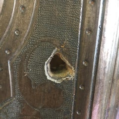 Antique Giltwood Wall Mirror Riddled with Bullets