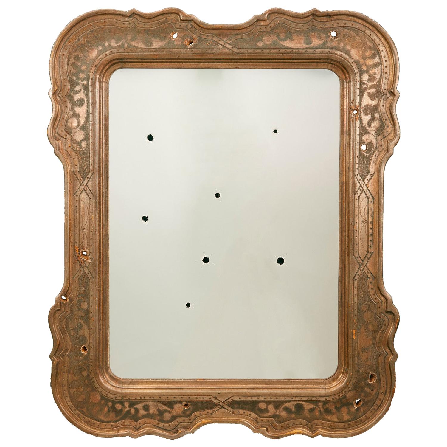 Antique Giltwood Wall Mirror Riddled with Bullets For Sale
