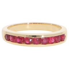 Contemporary Half Eternity Ruby Channel Ring in Yellow Gold