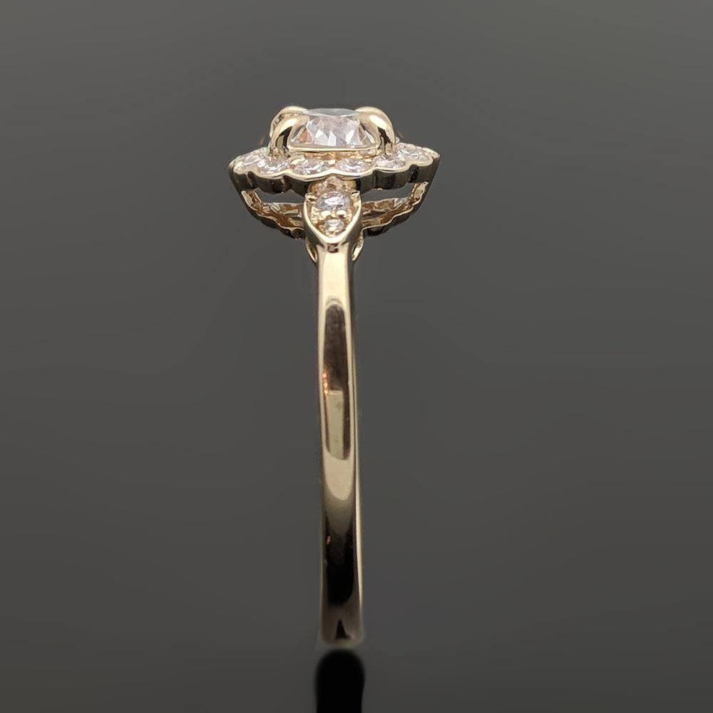 Round Cut Contemporary Halo 14 Karat Yellow Gold Diamond Ring For Sale